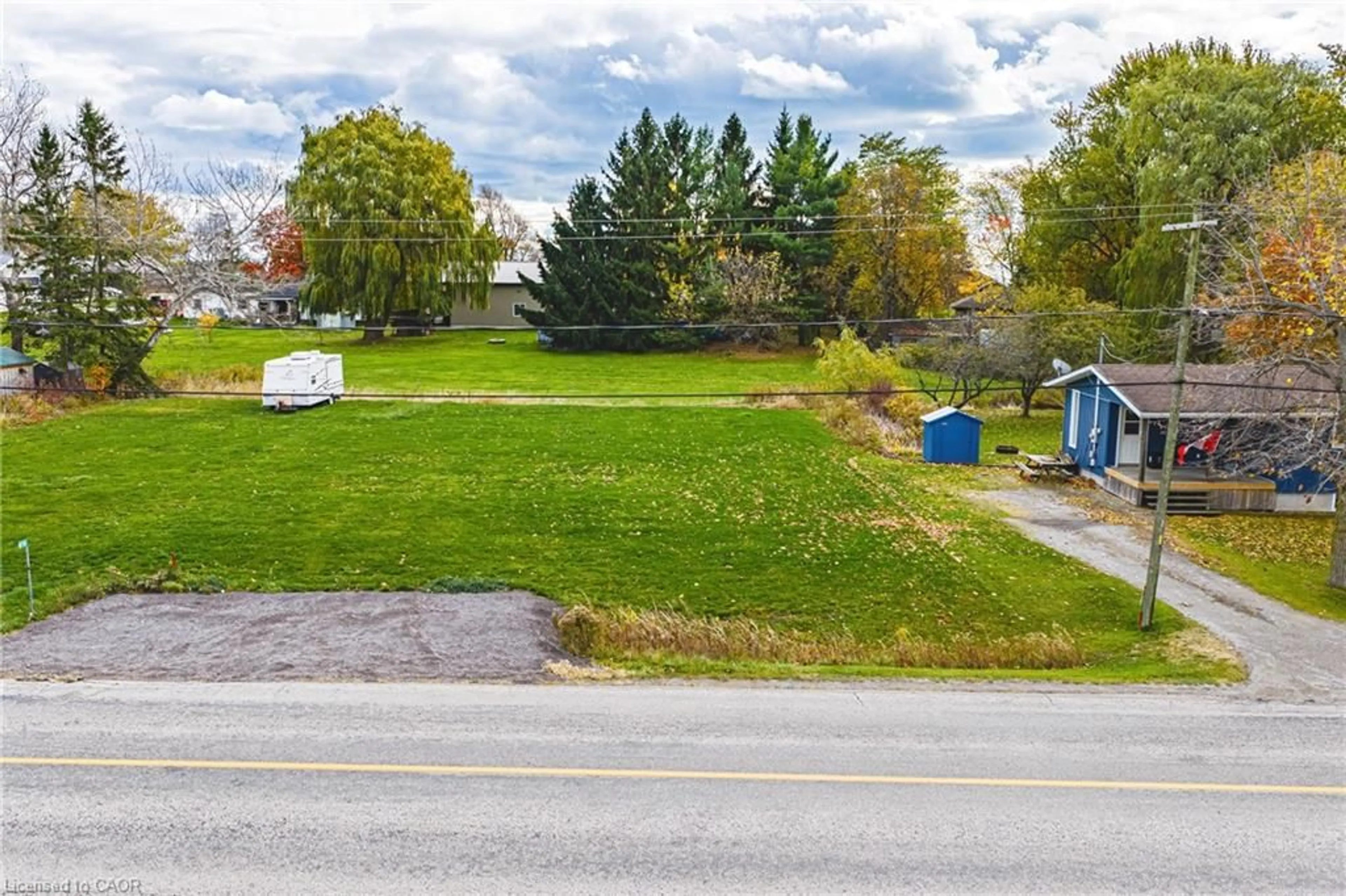 A pic from outside/outdoor area/front of a property/back of a property/a pic from drone, unknown for 610 New Lakeshore Rd, Port Dover Ontario N0A 1N3