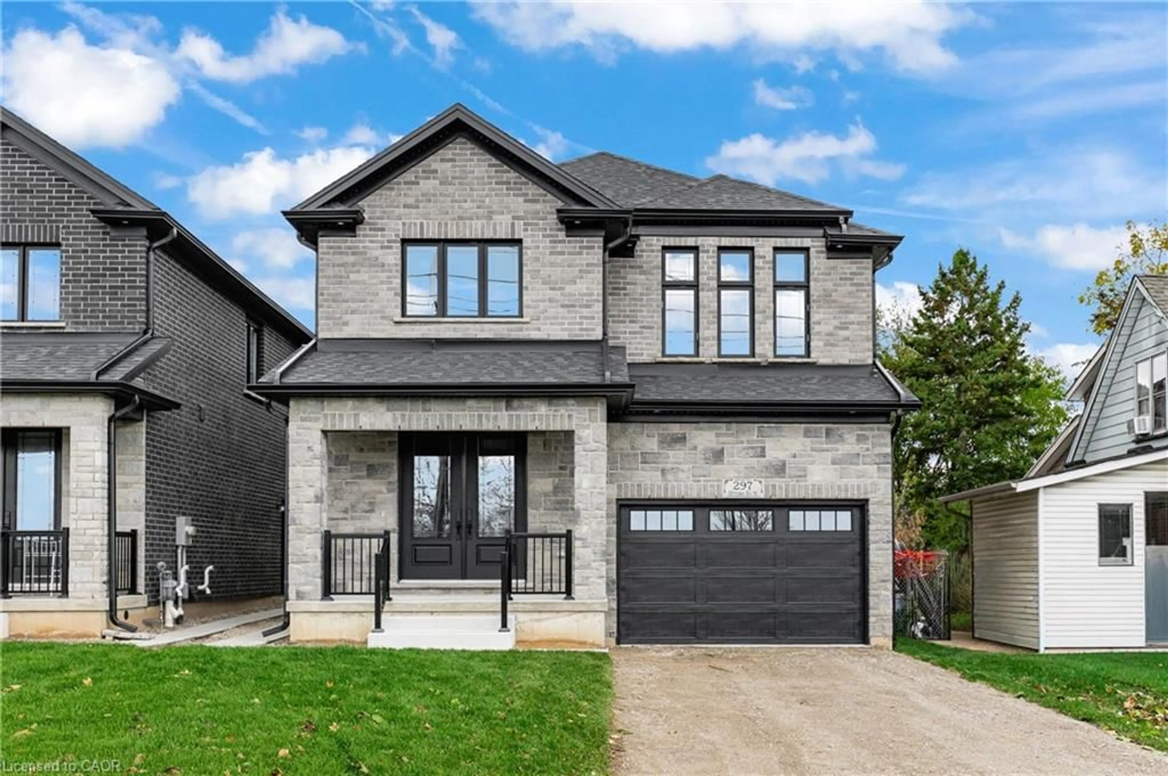 Home with brick exterior material, street for 297 Ottawa St, Kitchener Ontario N2H 3K9