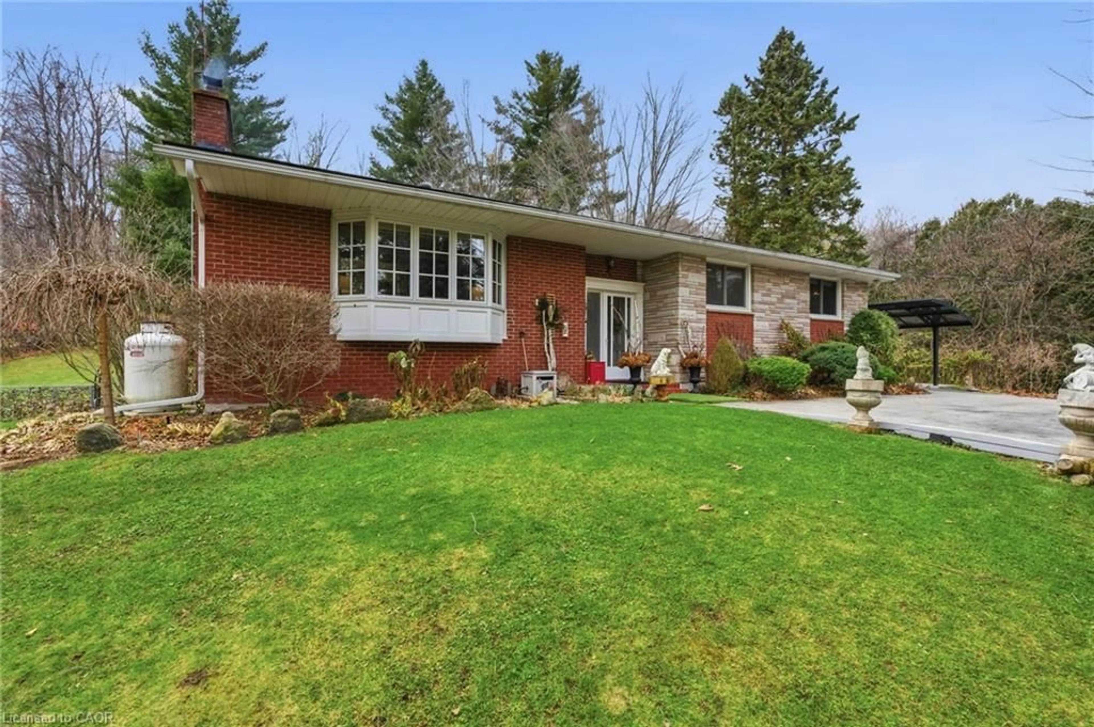 Home with brick exterior material, street for 5600 Cedar Springs Rd, Burlington Ontario L7P 0B9