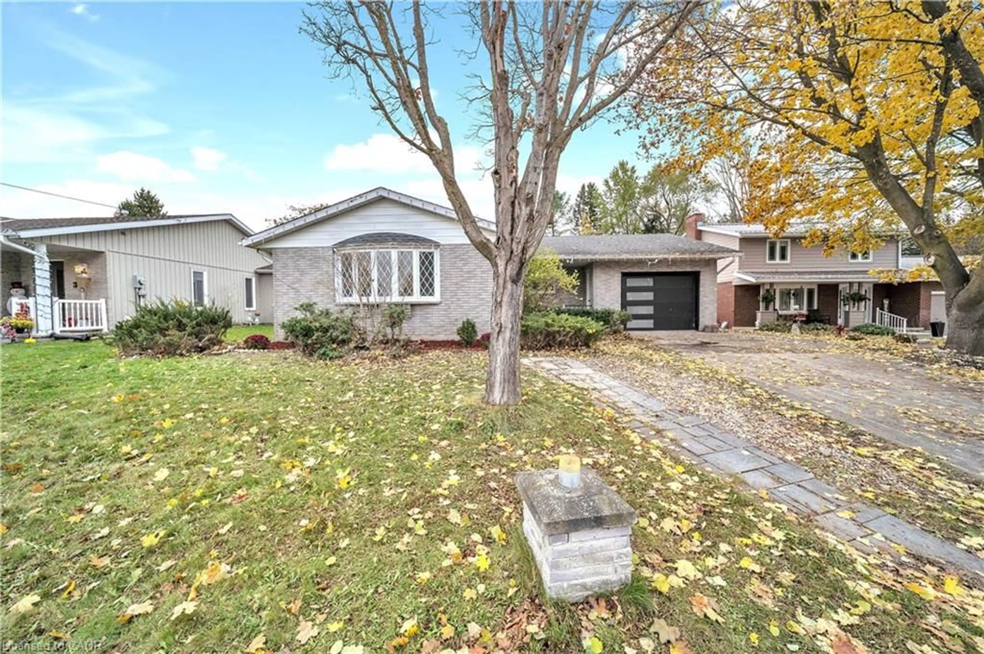 Home with brick exterior material, street for 5 Centennial Dr, Walkerton Ontario N0G 2V0