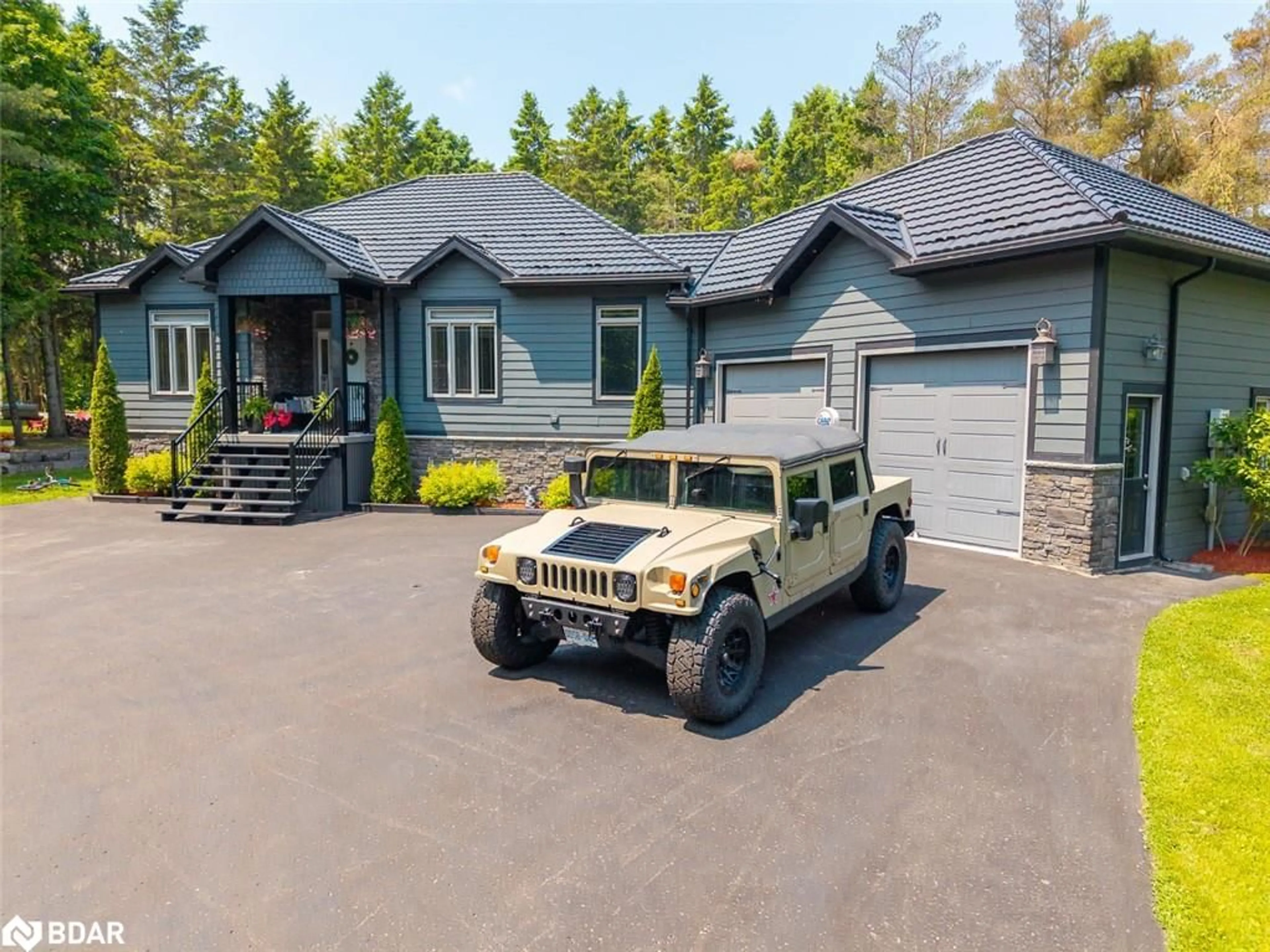 Home with vinyl exterior material, street for 7070 93 Hwy, Tiny Ontario L0K 2E0