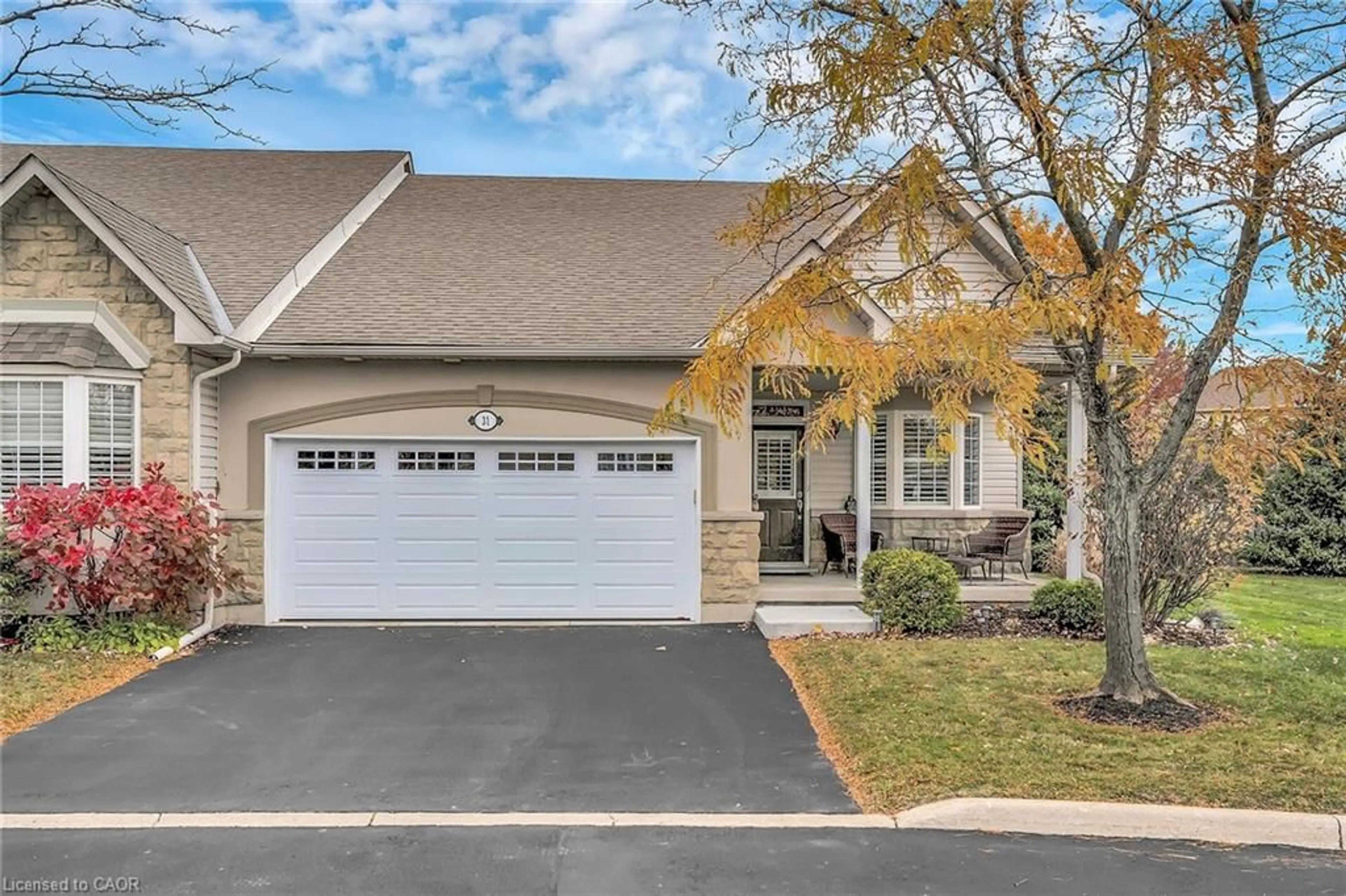 Home with brick exterior material, street for 212 Stonehenge Dr #31, Ancaster Ontario L9K 1N5