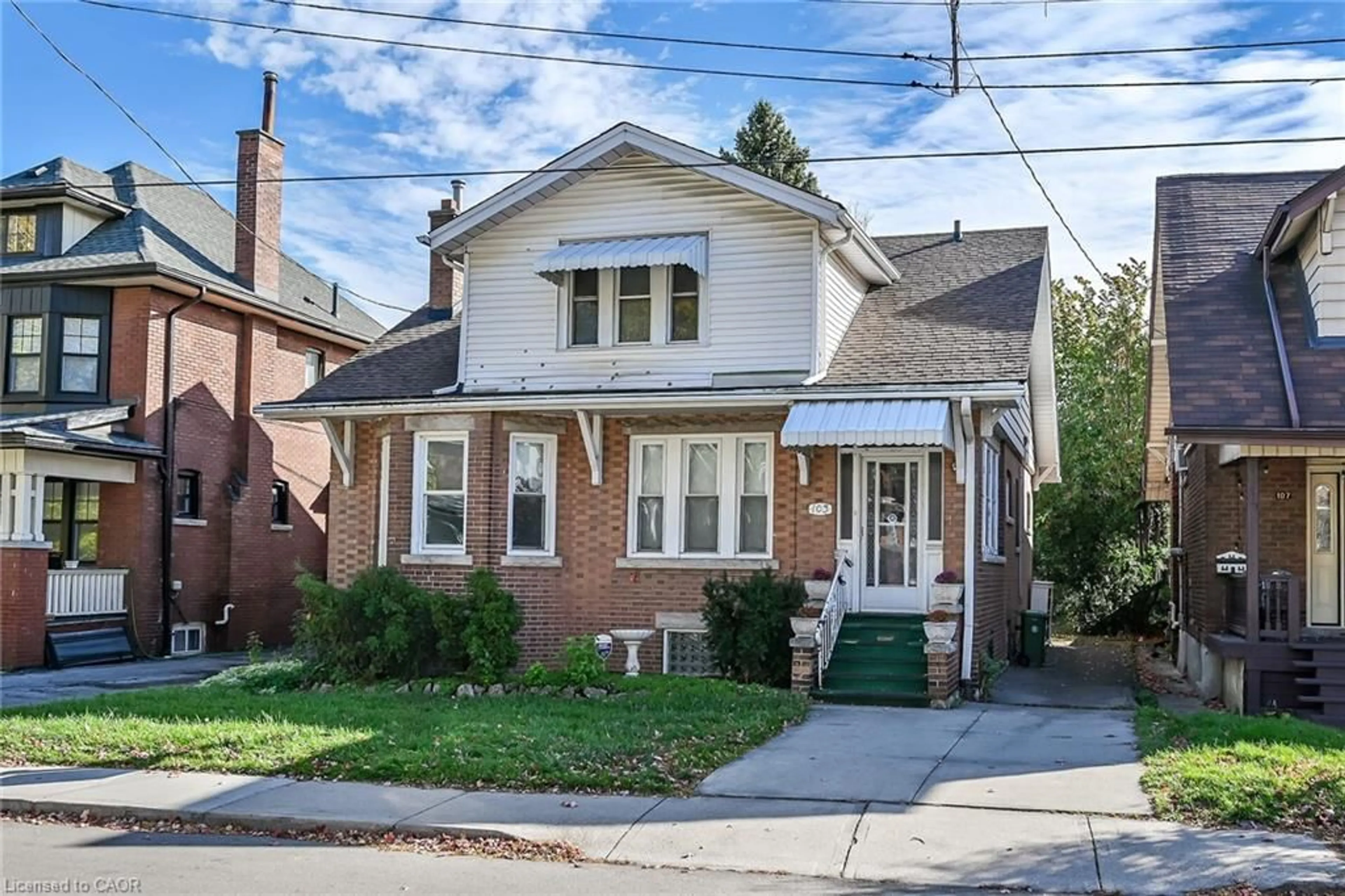 Home with brick exterior material, street for 103 Leinster Ave, Hamilton Ontario L8M 3A4