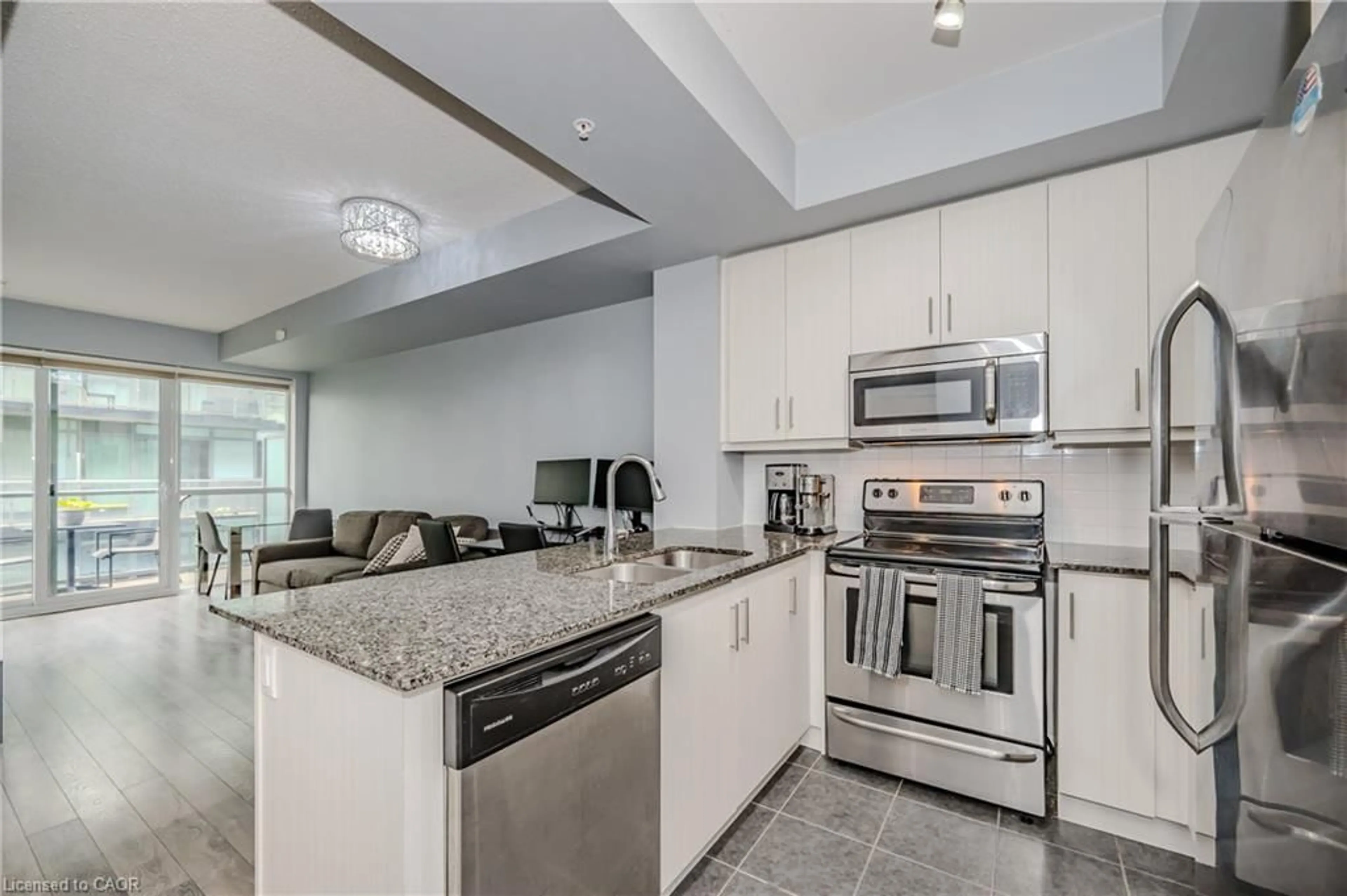 Open concept kitchen, ceramic/tile floor for 15 James Finlay Way #917, Toronto Ontario M3M 0B3