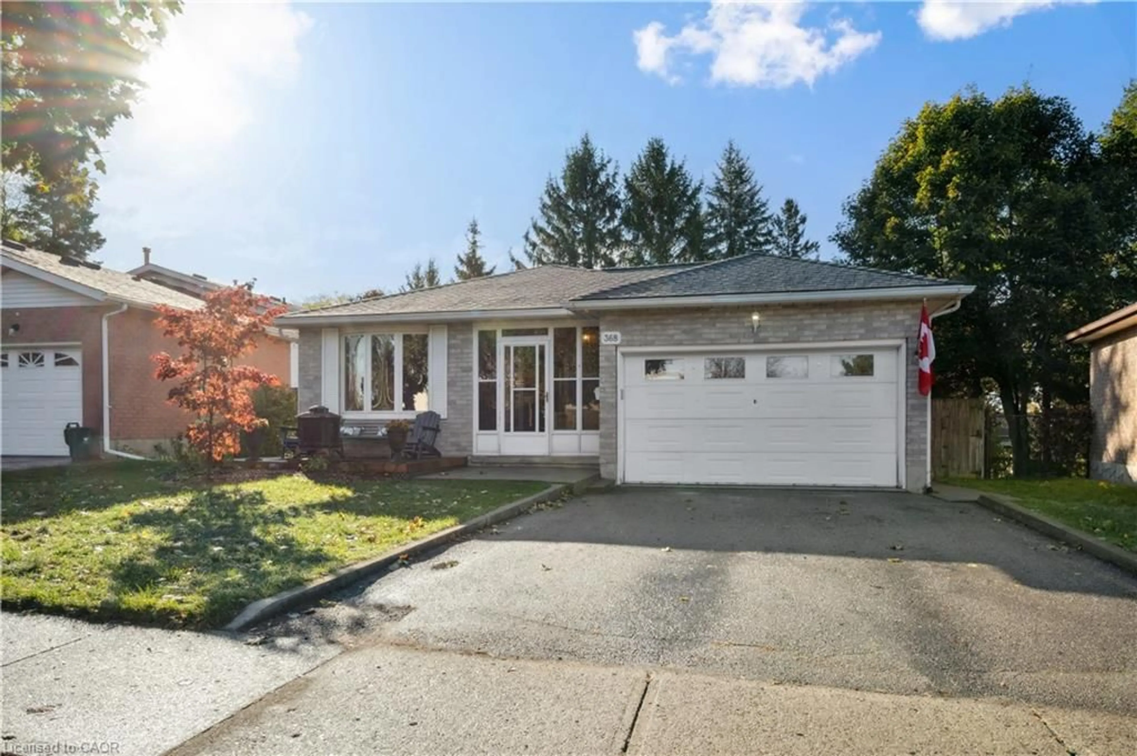 Home with vinyl exterior material, street for 368 The Country Way, Kitchener Ontario N2E 3E4