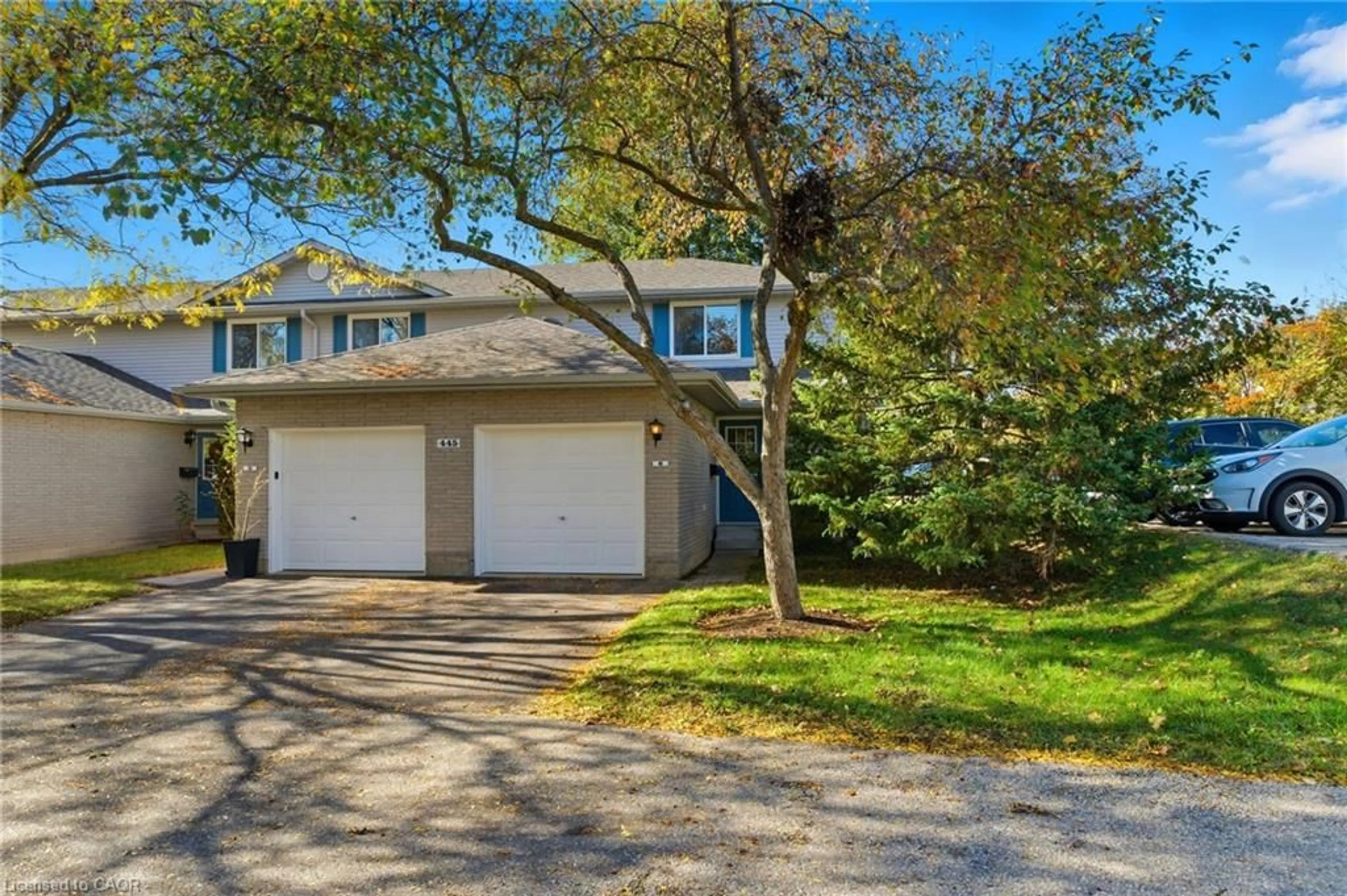 Home with vinyl exterior material, street for 445 Kingscourt Dr #6, Waterloo Ontario N2K 3R4