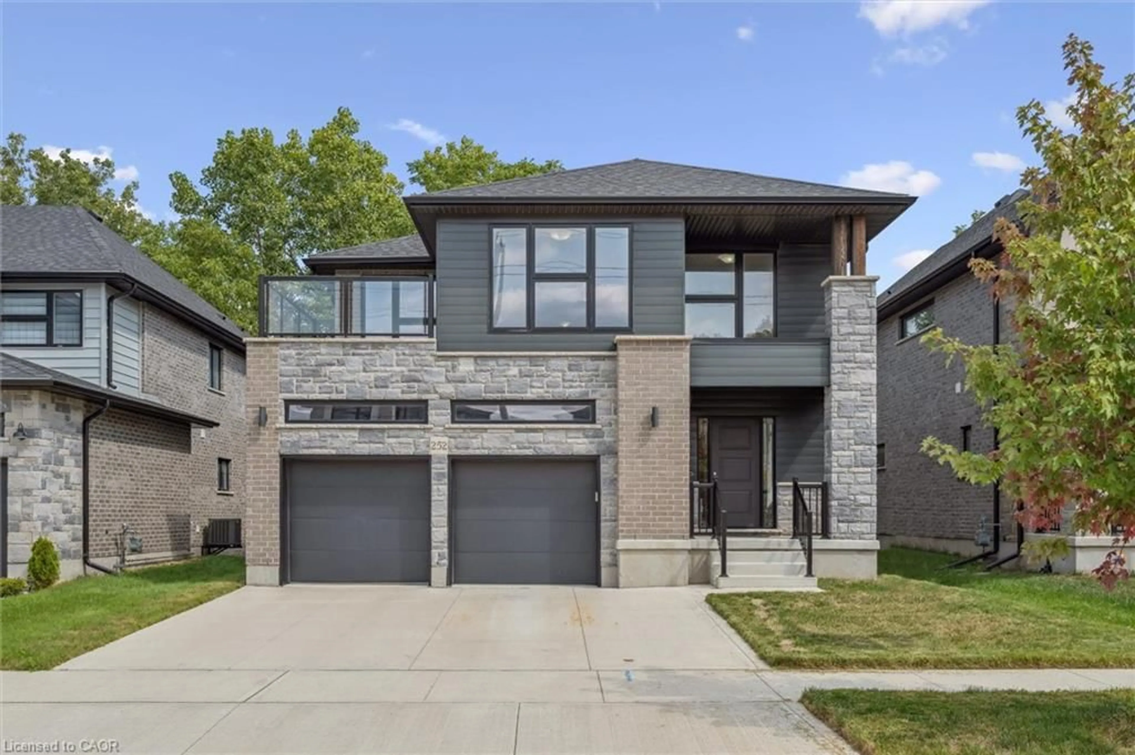 Home with brick exterior material, street for 252 Otterbein Rd, Kitchener Ontario N2B 0A7