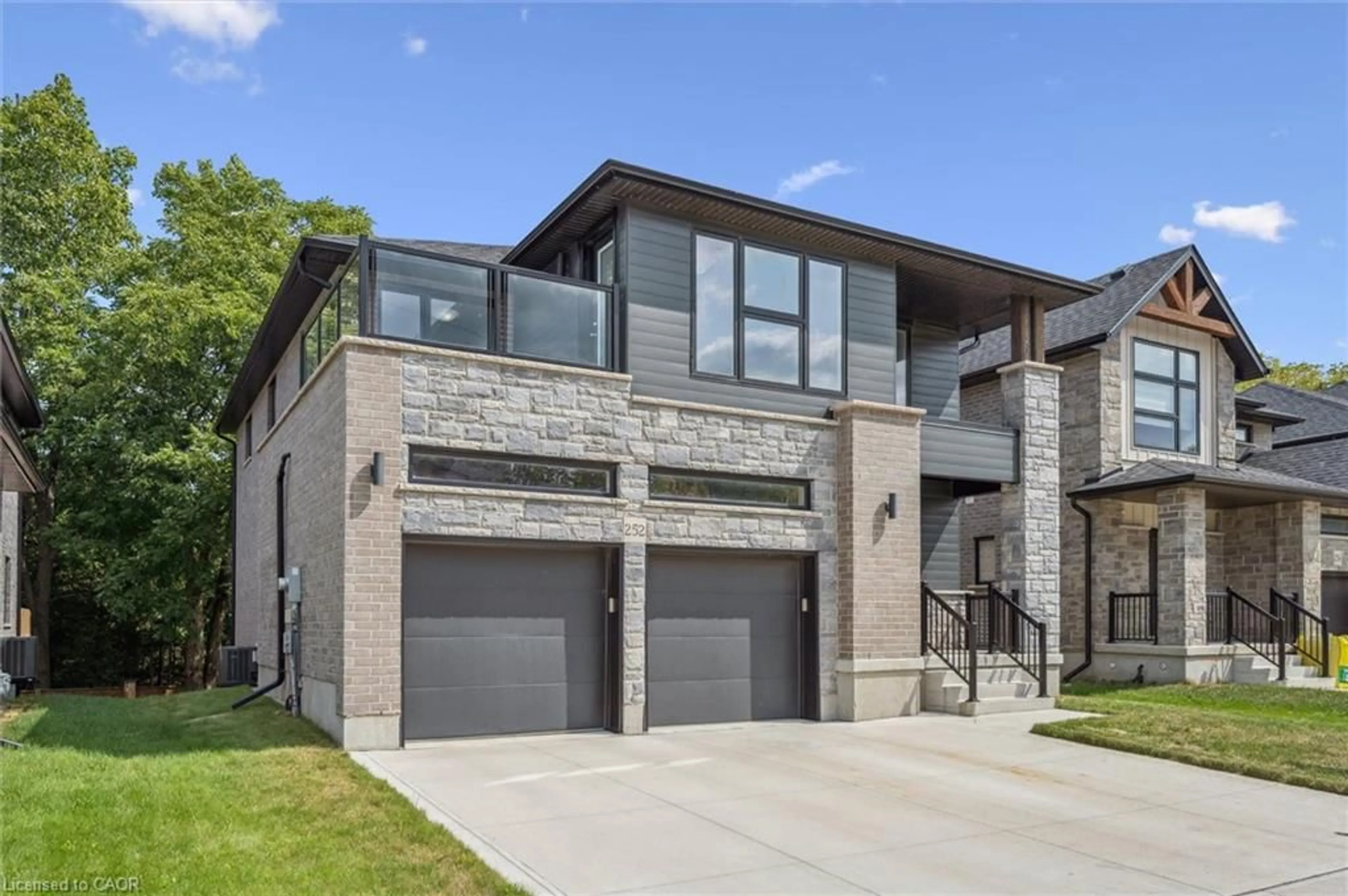 Home with brick exterior material, street for 252 Otterbein Rd, Kitchener Ontario N2B 0A7