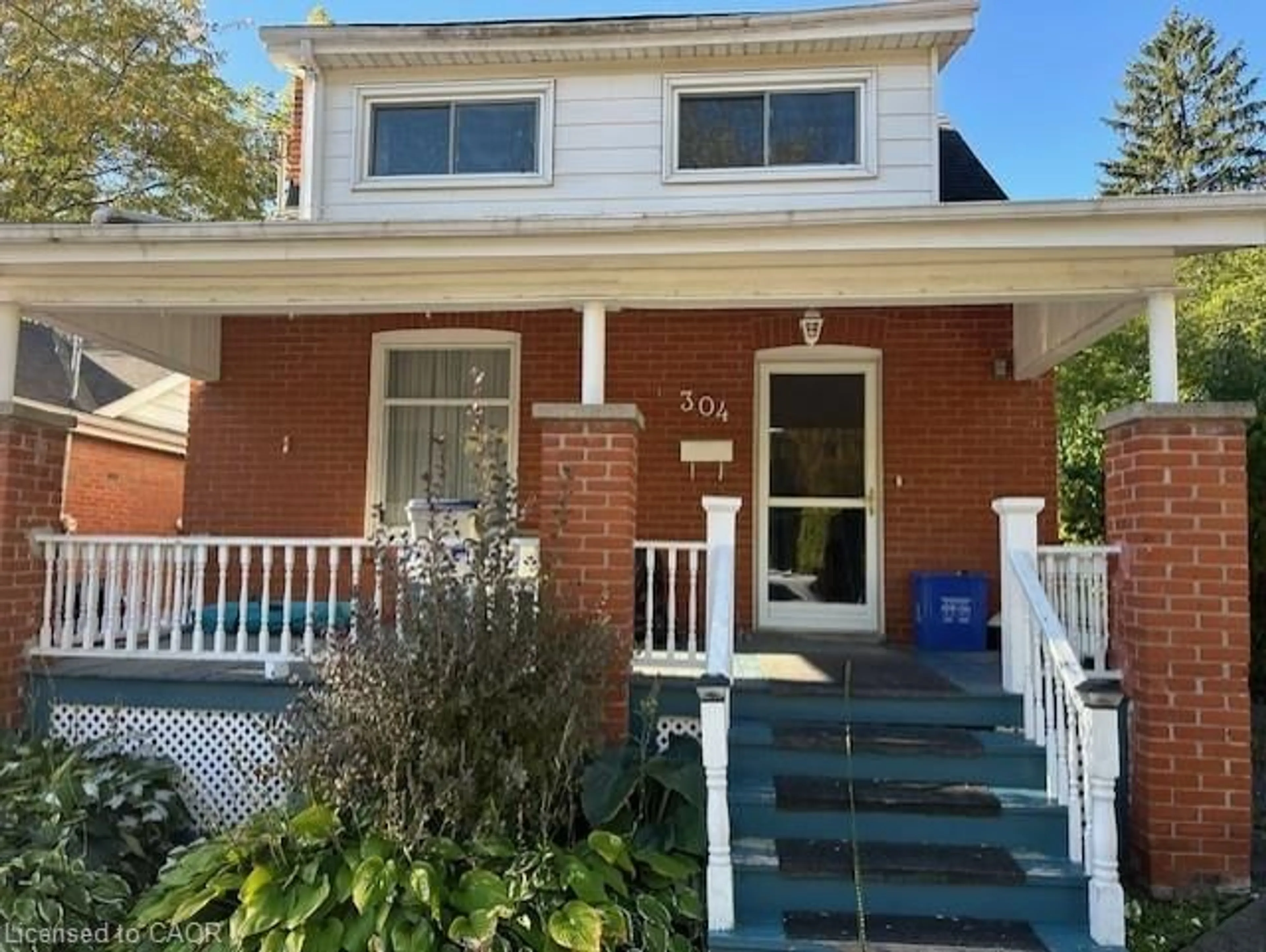 Home with brick exterior material, street for 304 Park St, Hamilton Ontario L9H 1Y9