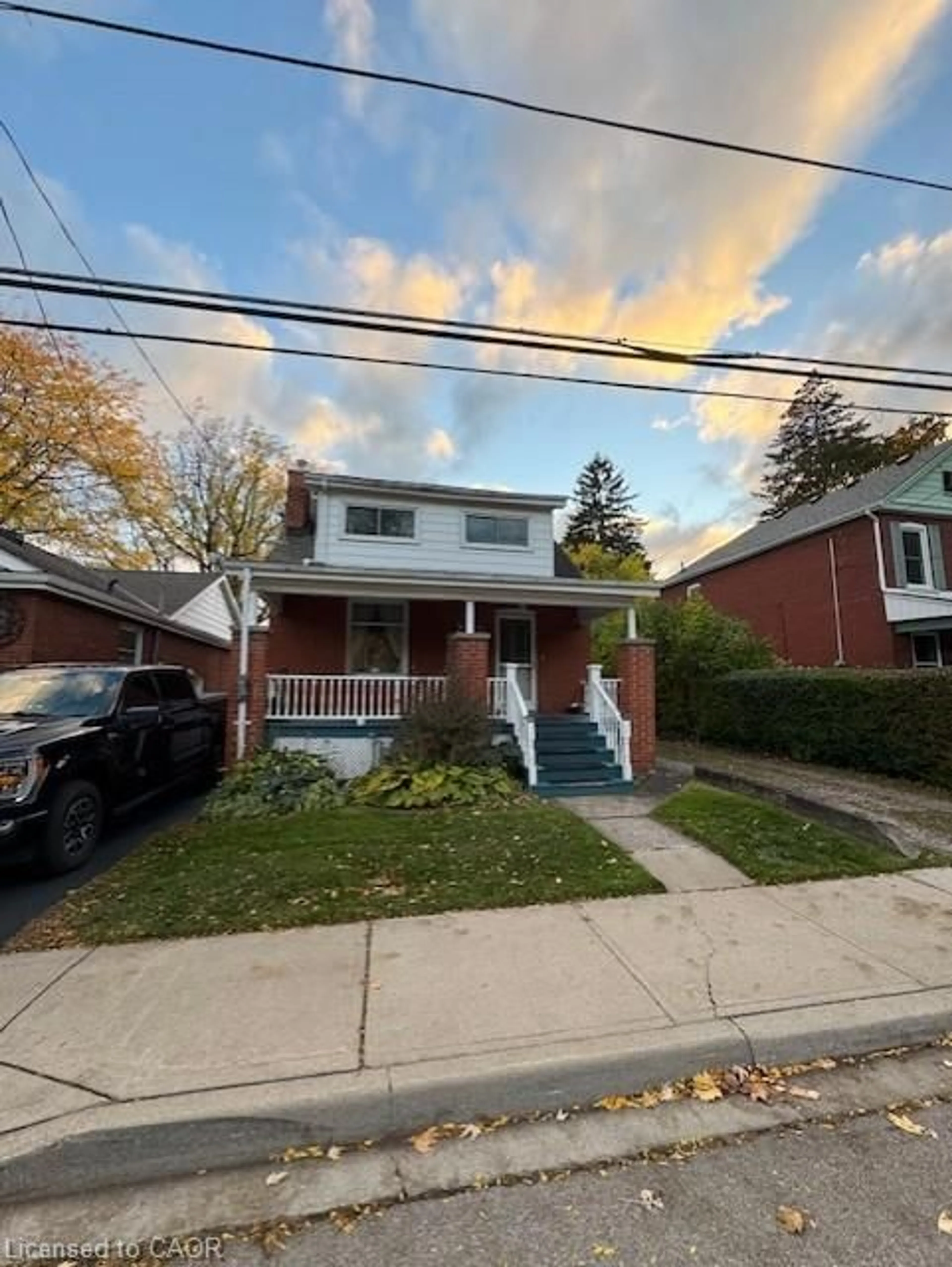 Home with brick exterior material, street for 304 Park St, Hamilton Ontario L9H 1Y9