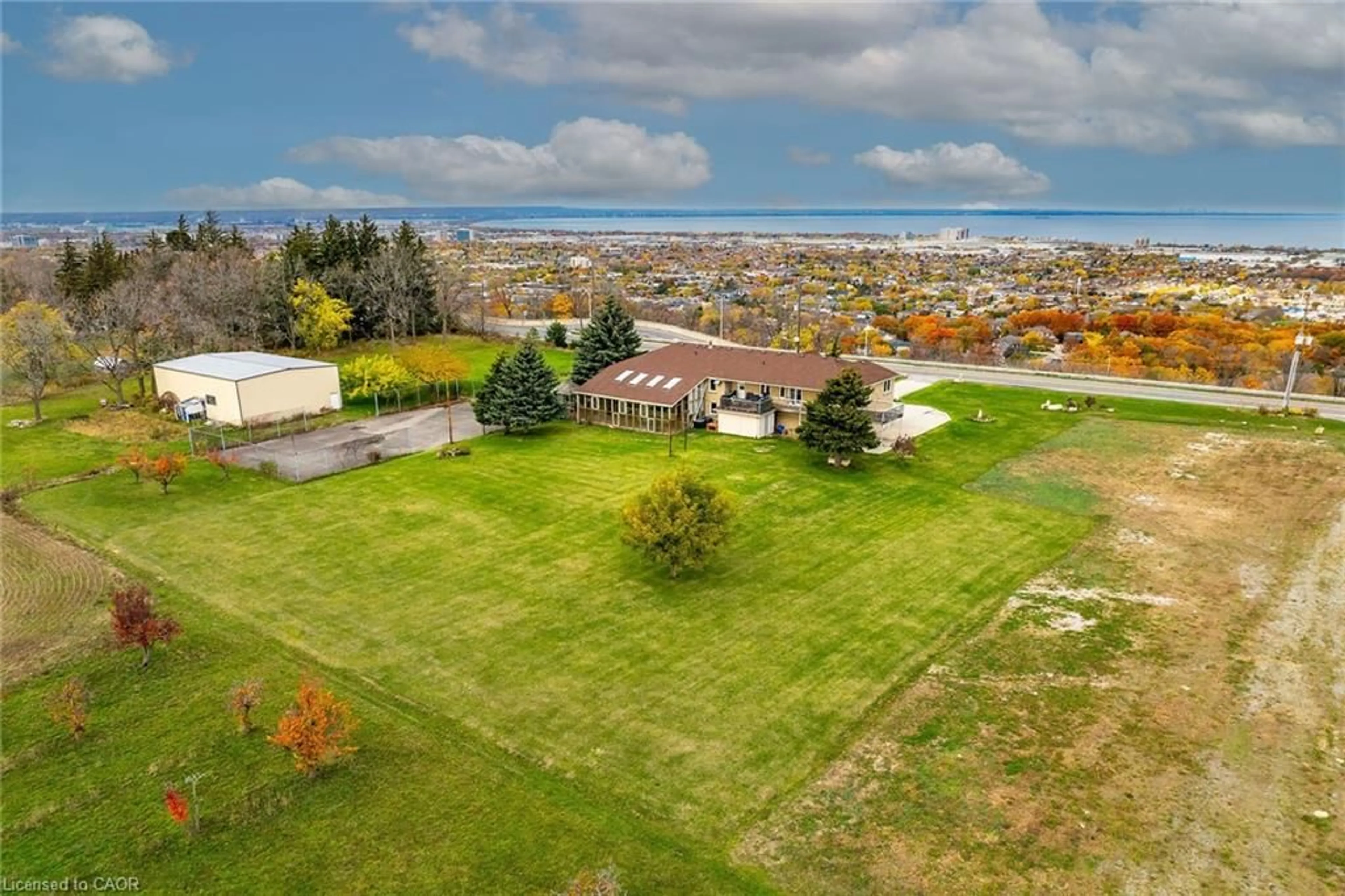 A pic from outside/outdoor area/front of a property/back of a property/a pic from drone, water/lake/river/ocean view for 568 Ridge Rd, Stoney Creek Ontario L8J 2Y6