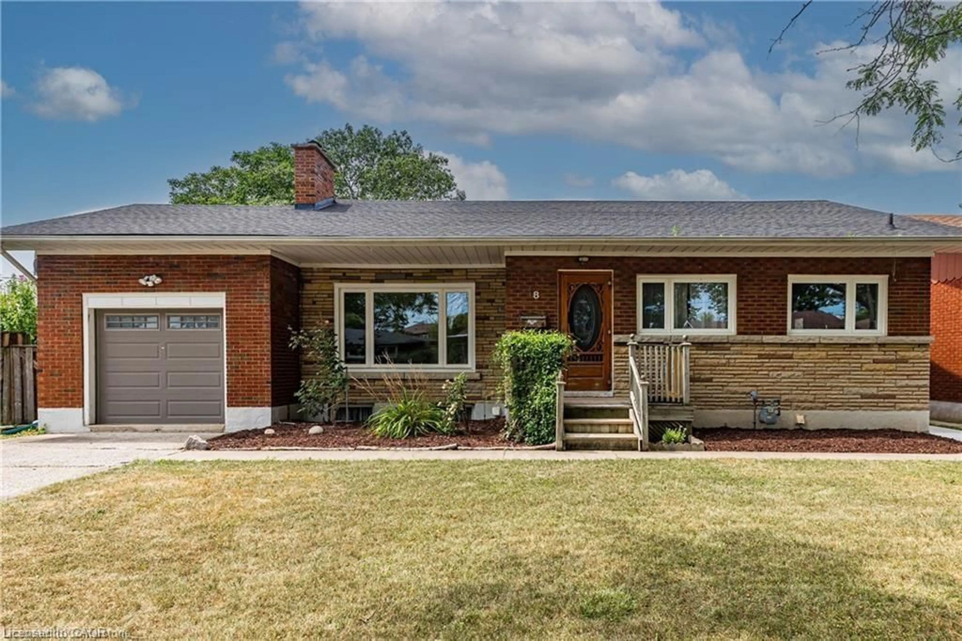 Home with brick exterior material, street for 18 Masterson Dr, St. Catharines Ontario L2T 3P1