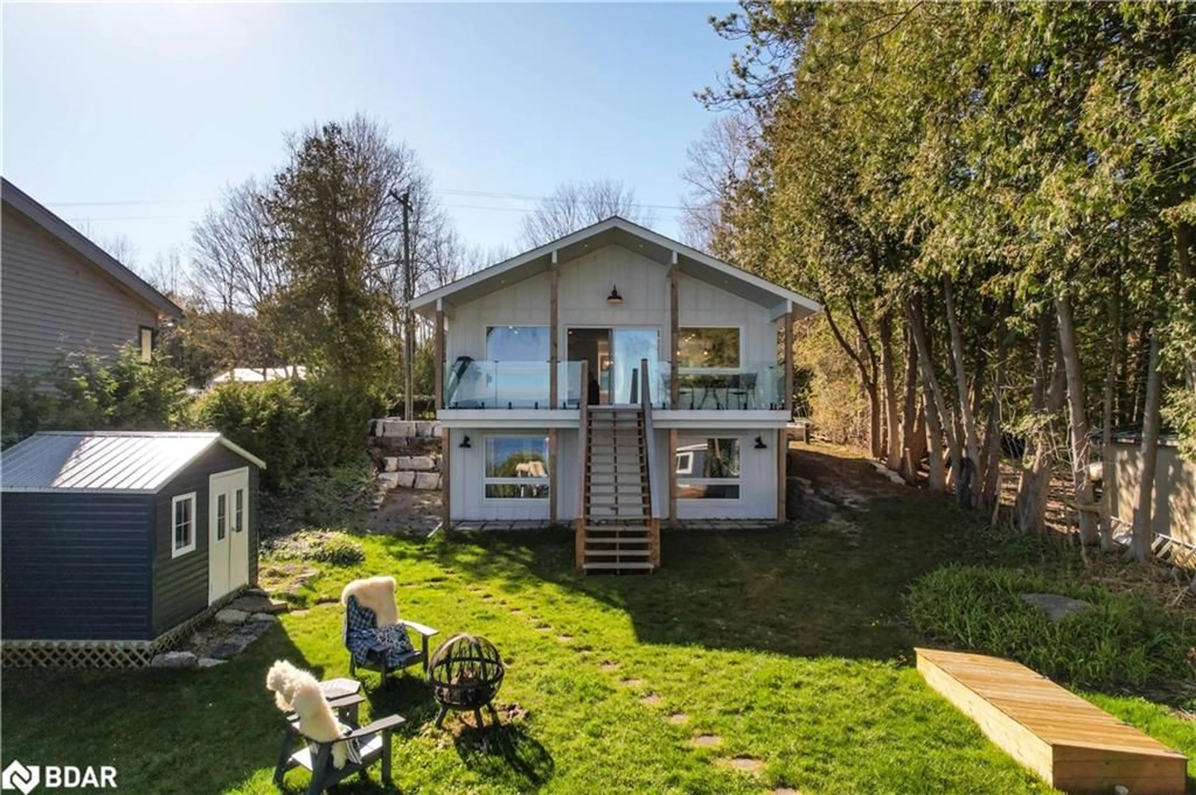 A pic from outside/outdoor area/front of a property/back of a property/a pic from drone, unknown for 2371 Lakeshore Rd, Oro-Medonte Ontario L0L 1T0