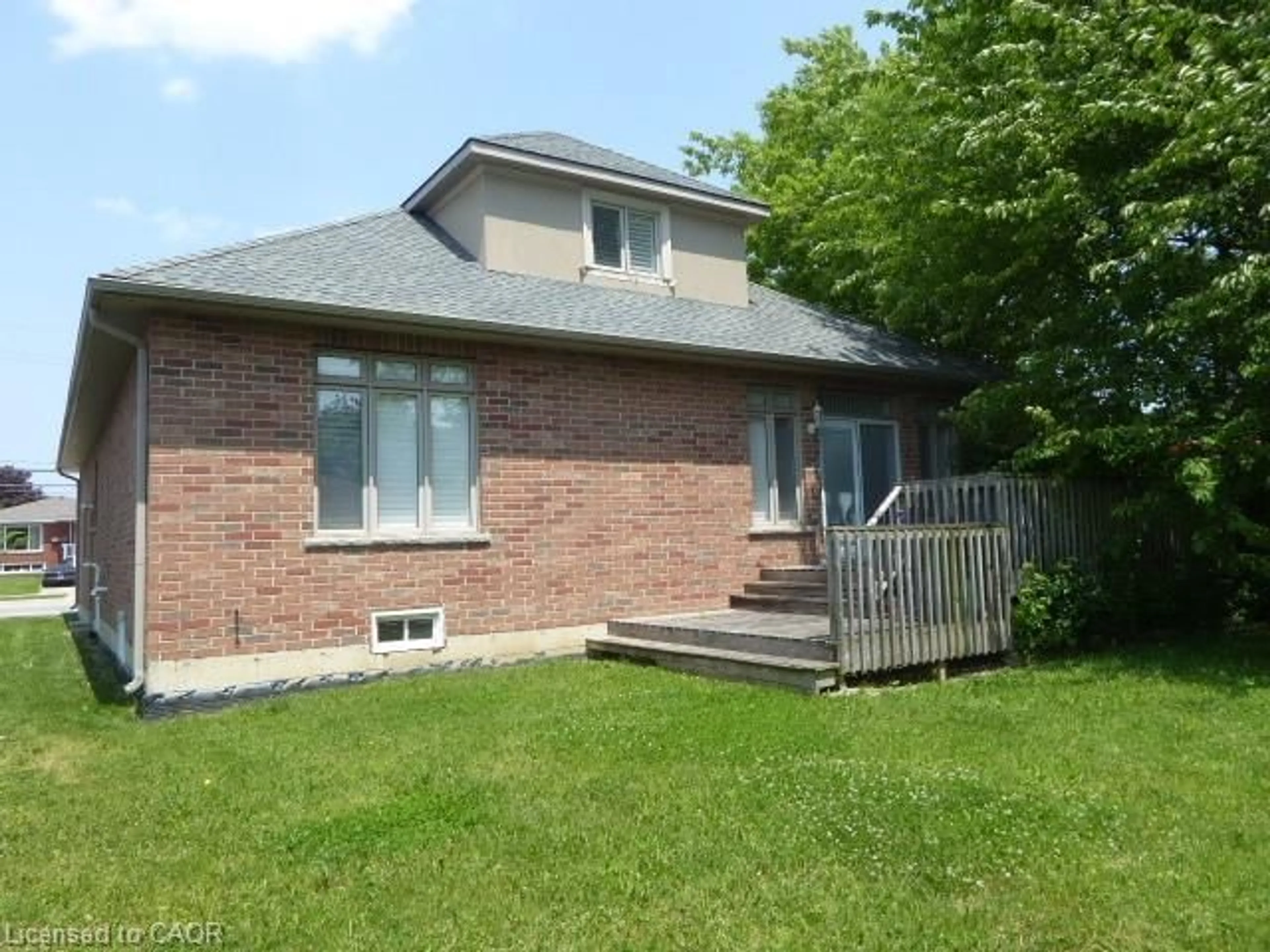 Home with brick exterior material, street for 129 Highland Rd, Stoney Creek Ontario L8J 2S7