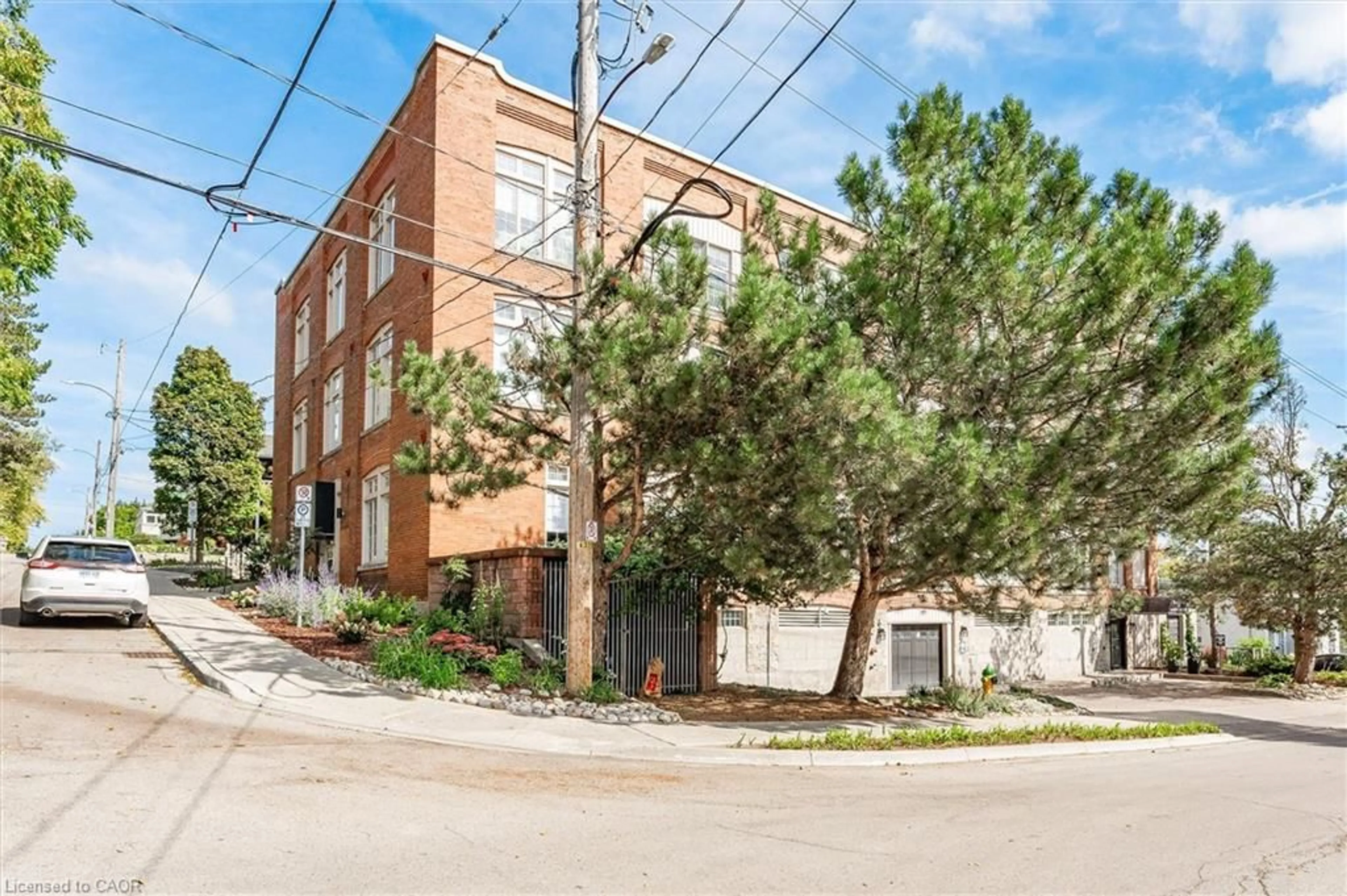 Home with brick exterior material, street for 40 Northumberland St #106, Guelph Ontario N1H 3A5
