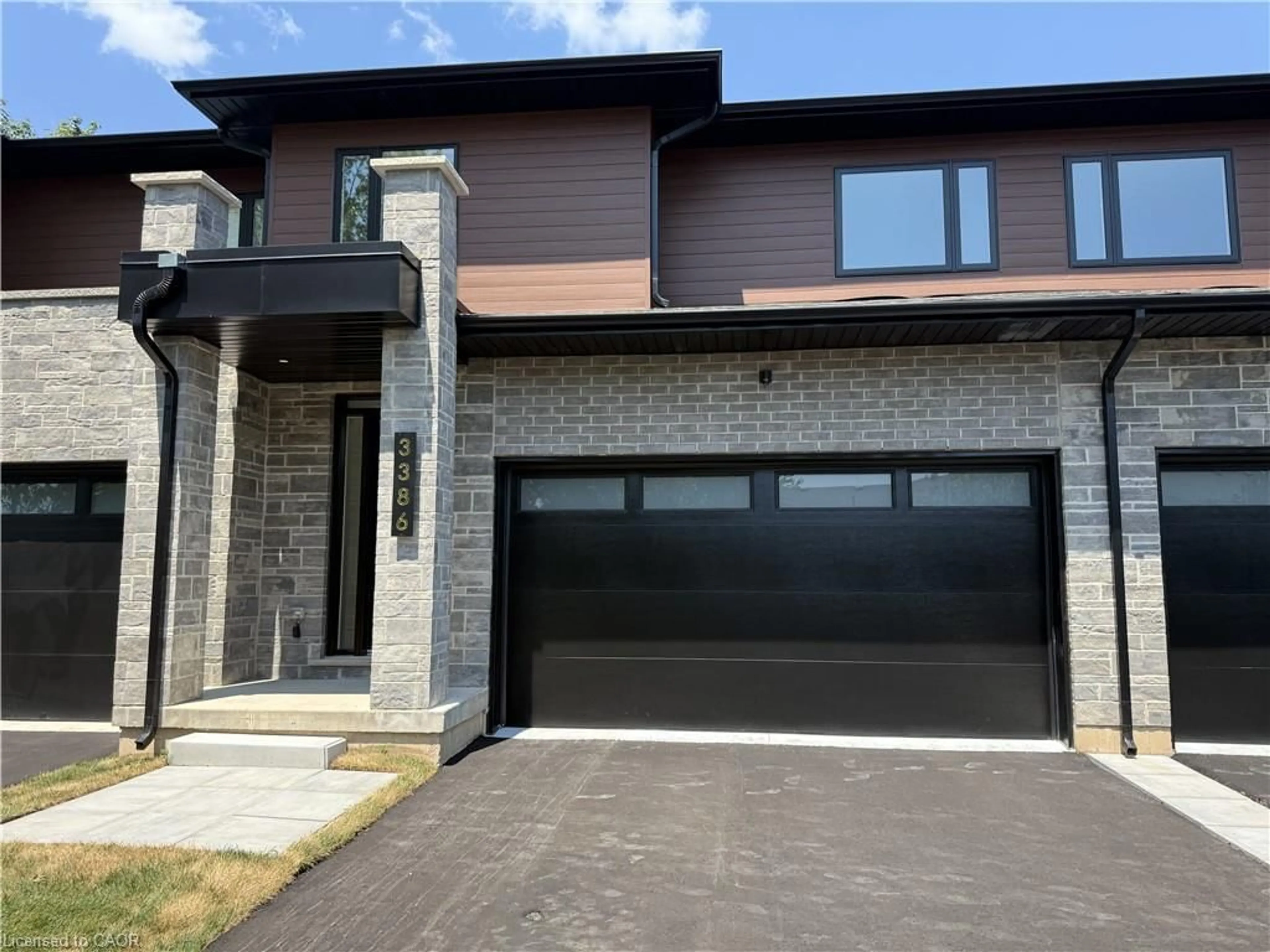 Home with brick exterior material, street for 3392 Carter Common #5, Burlington Ontario L7M 0Z3