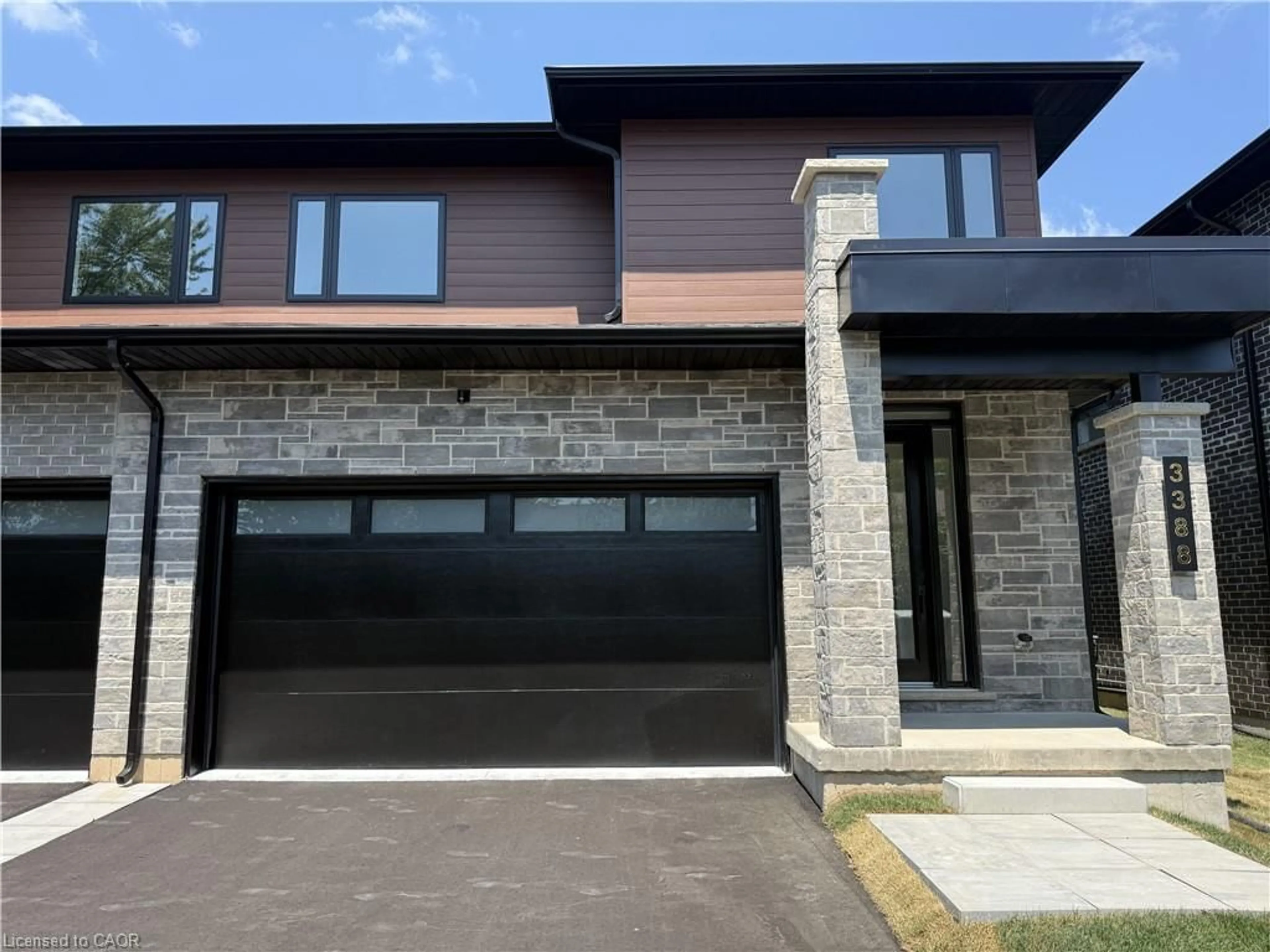 Home with brick exterior material, street for 3392 Carter Common #5, Burlington Ontario L7M 0Z3