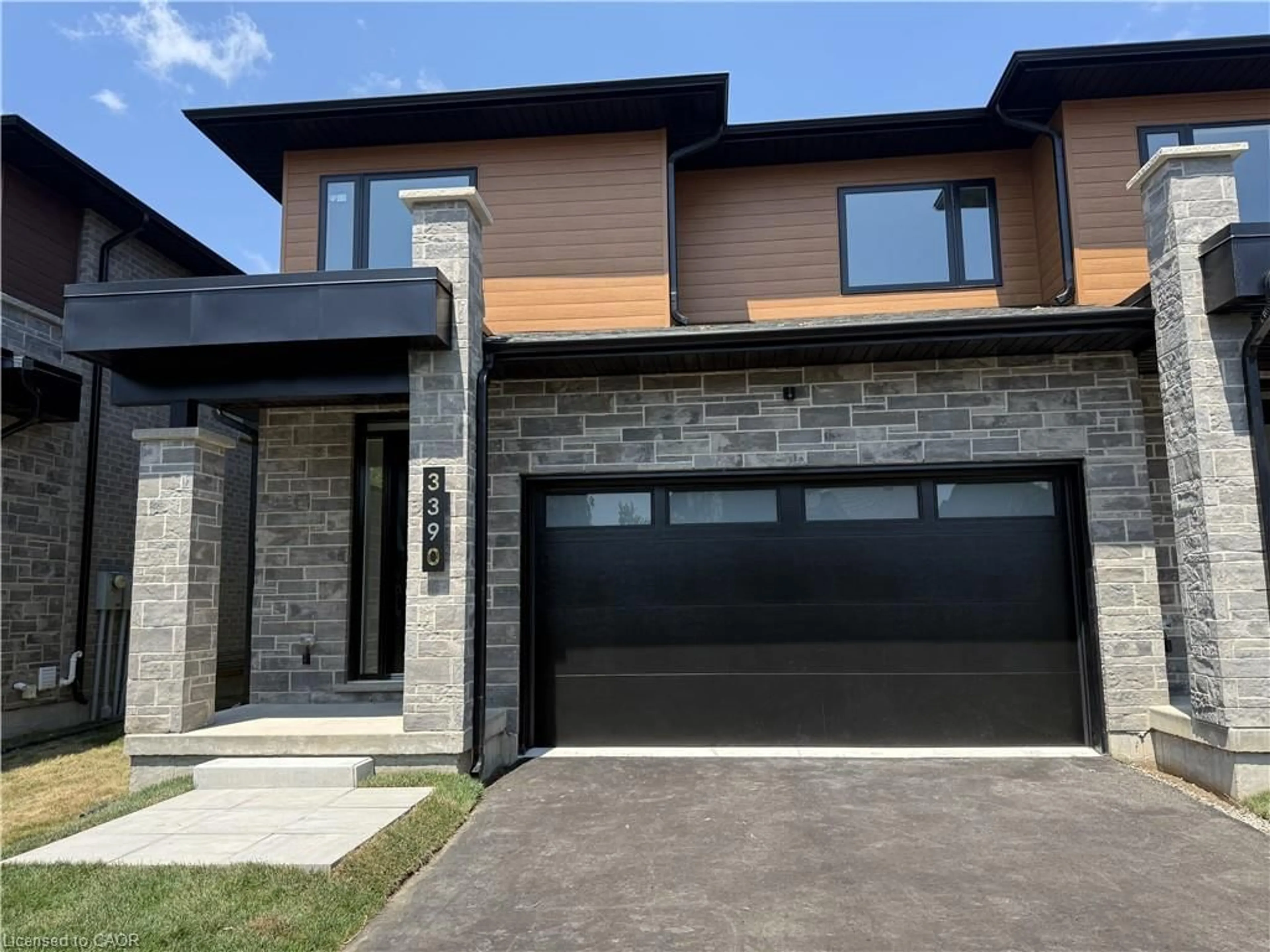 Home with brick exterior material, street for 3392 Carter Common #5, Burlington Ontario L7M 0Z3