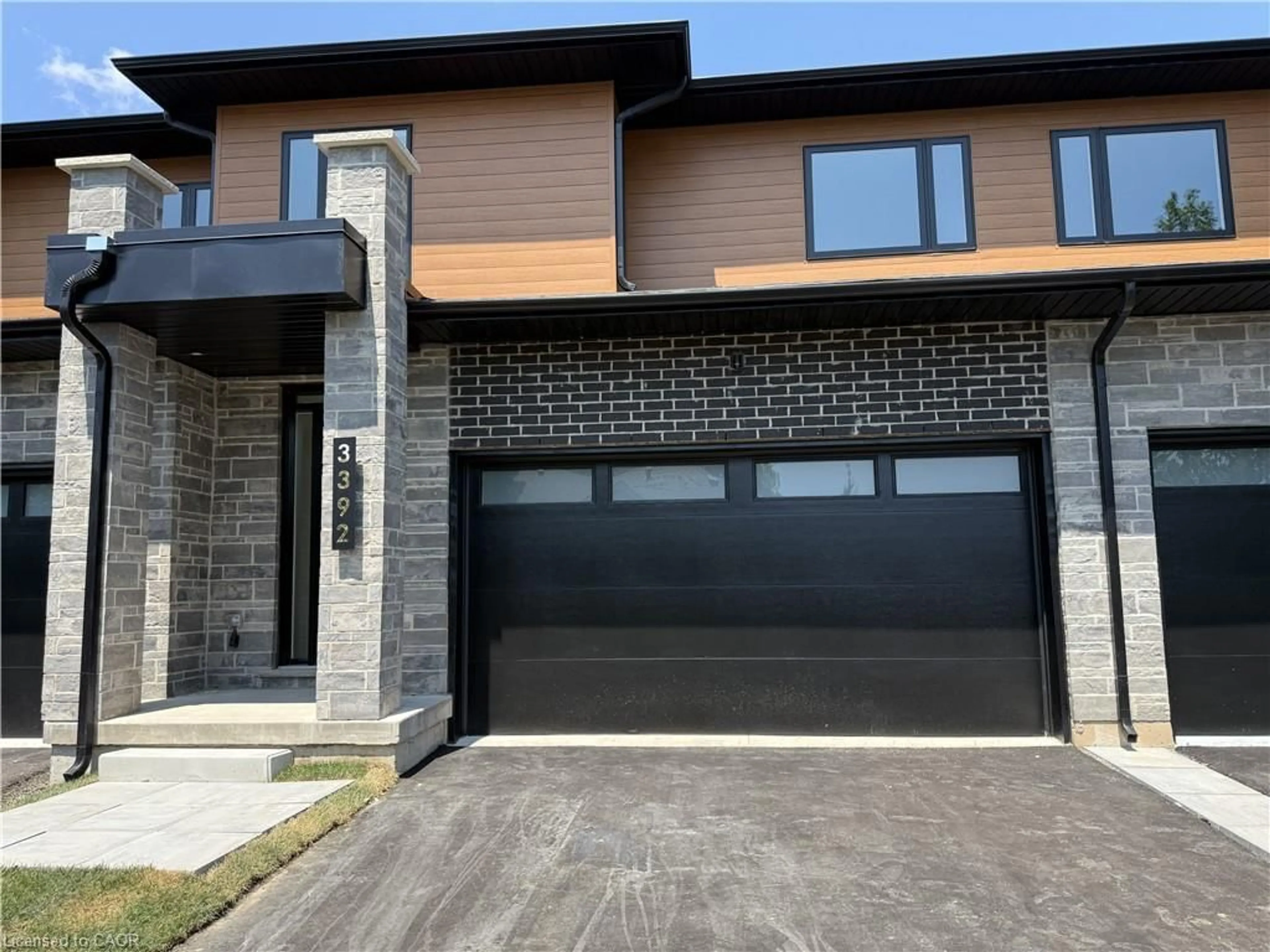 Home with brick exterior material, street for 3392 Carter Common #5, Burlington Ontario L7M 0Z3