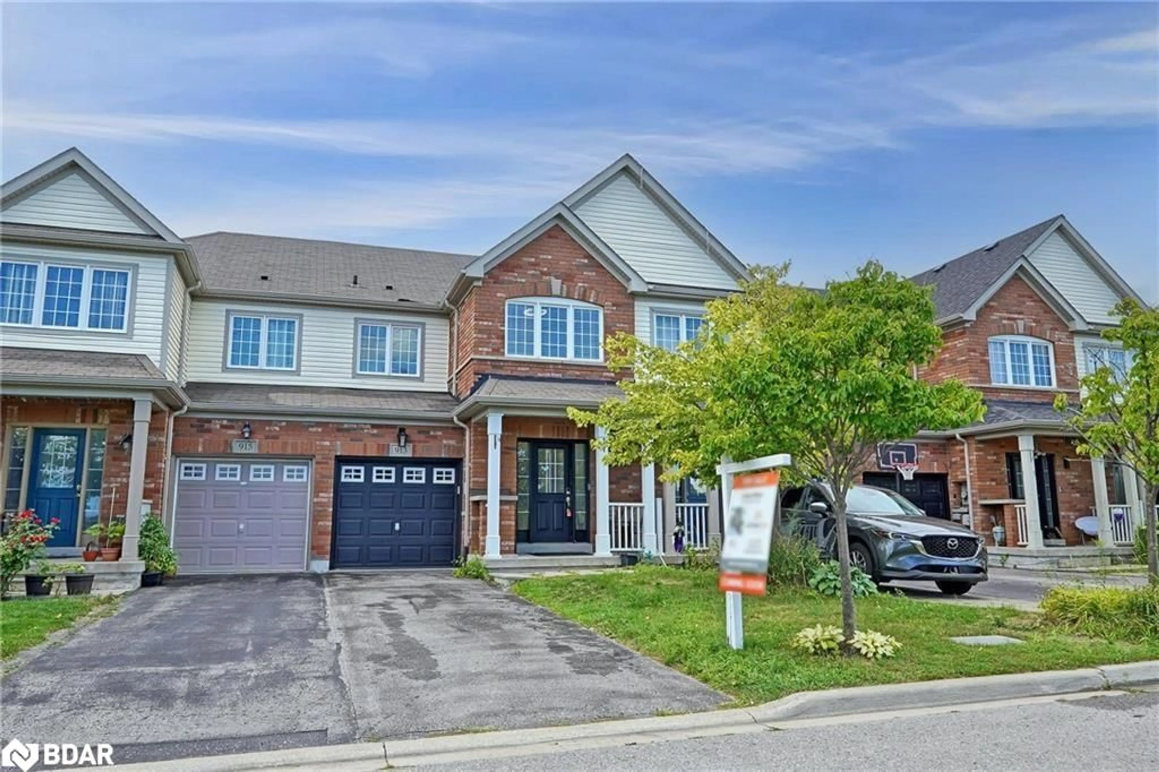 Home with brick exterior material, street for 913 Fetchison Dr, Oshawa Ontario L1K 0L3