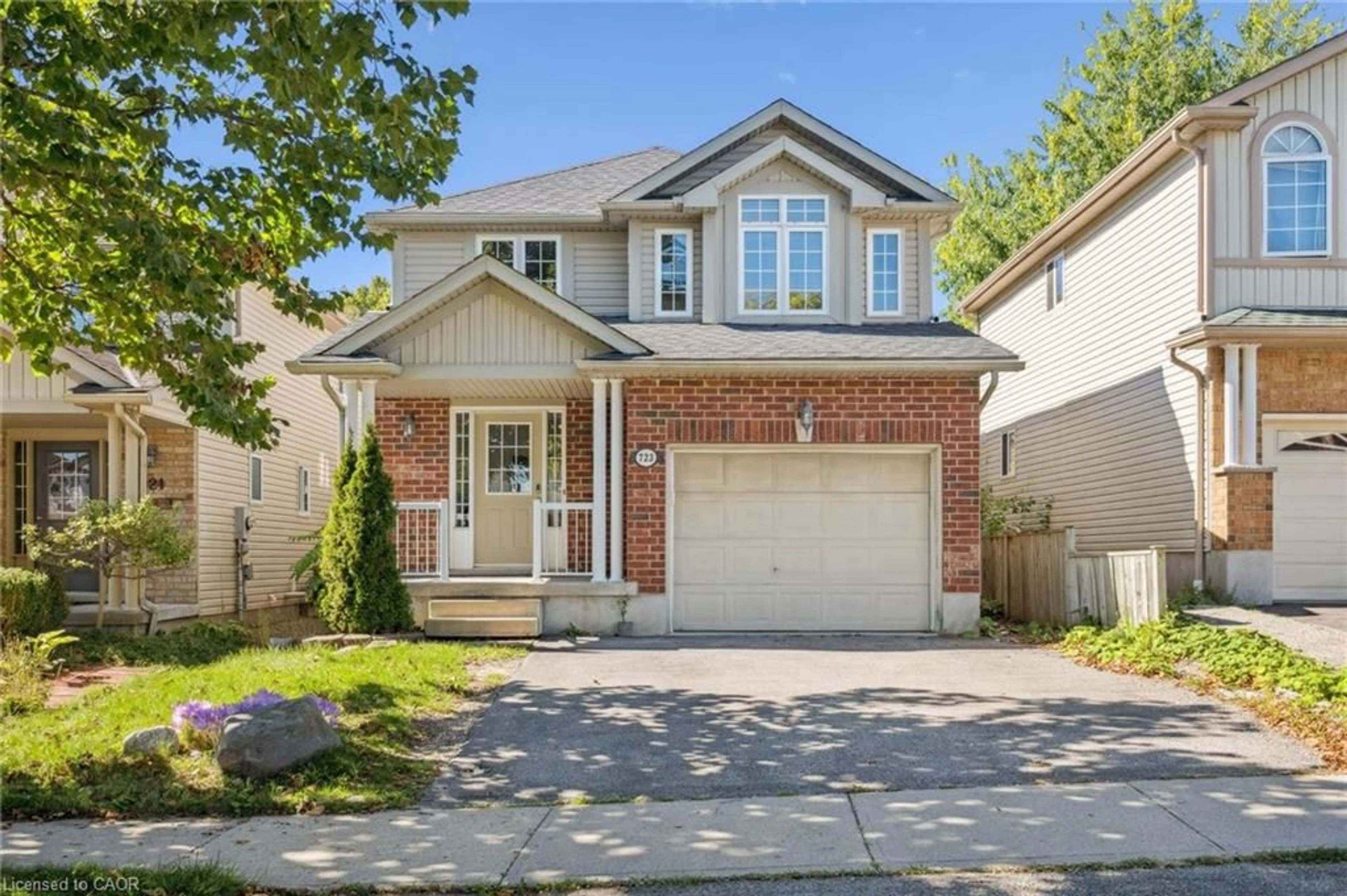 Home with brick exterior material, street for 723 Black Cherry St, Waterloo Ontario N2V 2P3