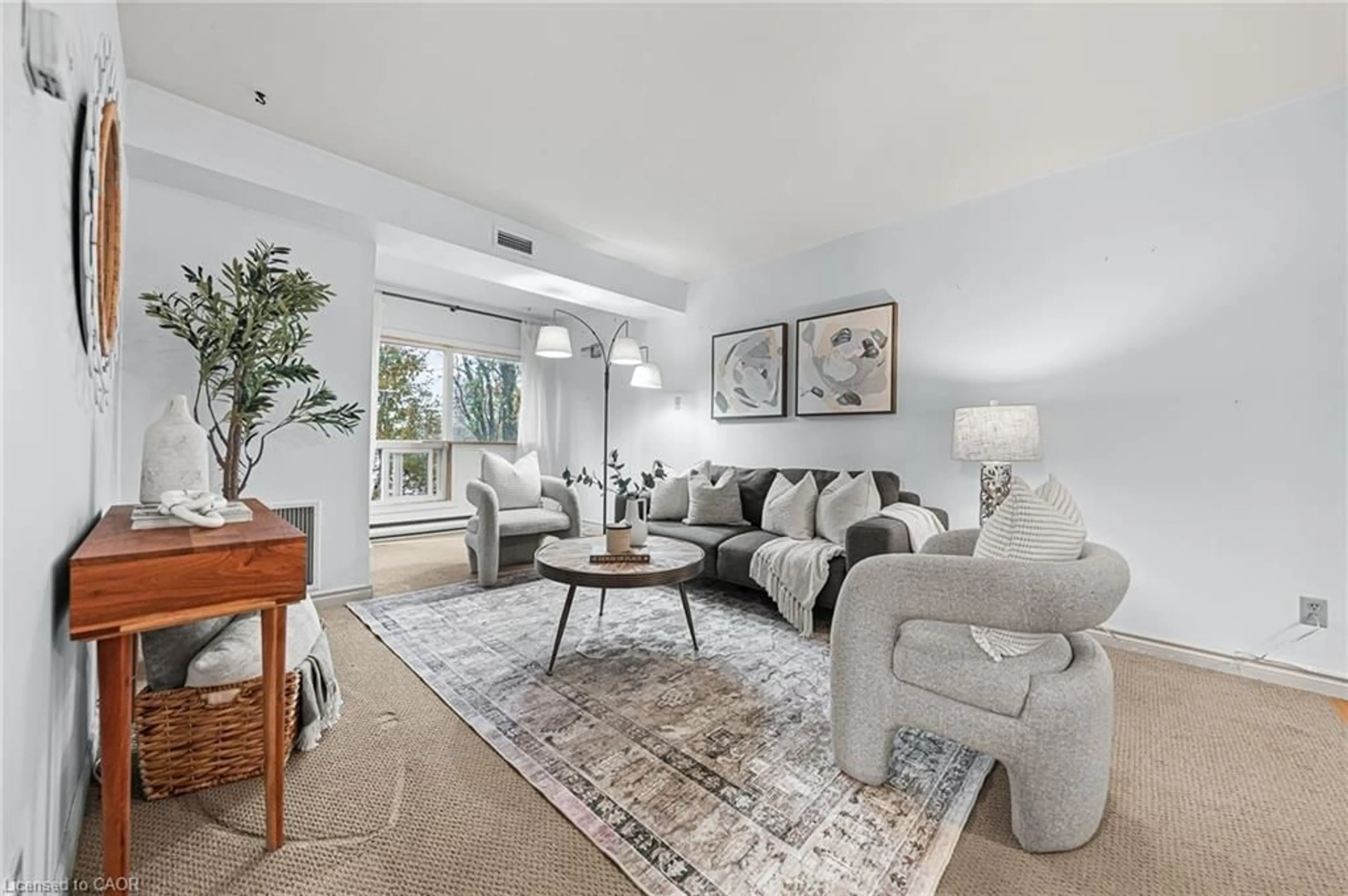 Living room with furniture, unknown for 500 Westmount Rd #410, Kitchener Ontario N2M 5M9