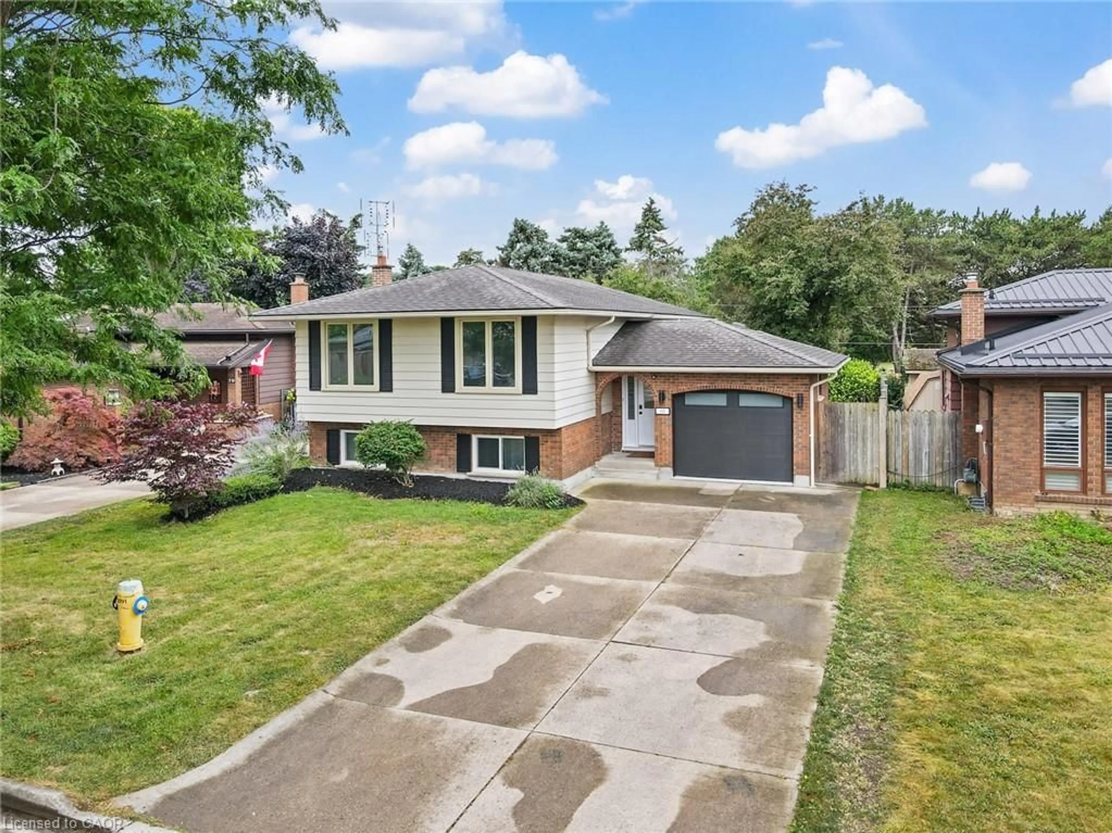 Home with brick exterior material, street for 68 Ziraldo Dr, St. Catharines Ontario L2N 6T1
