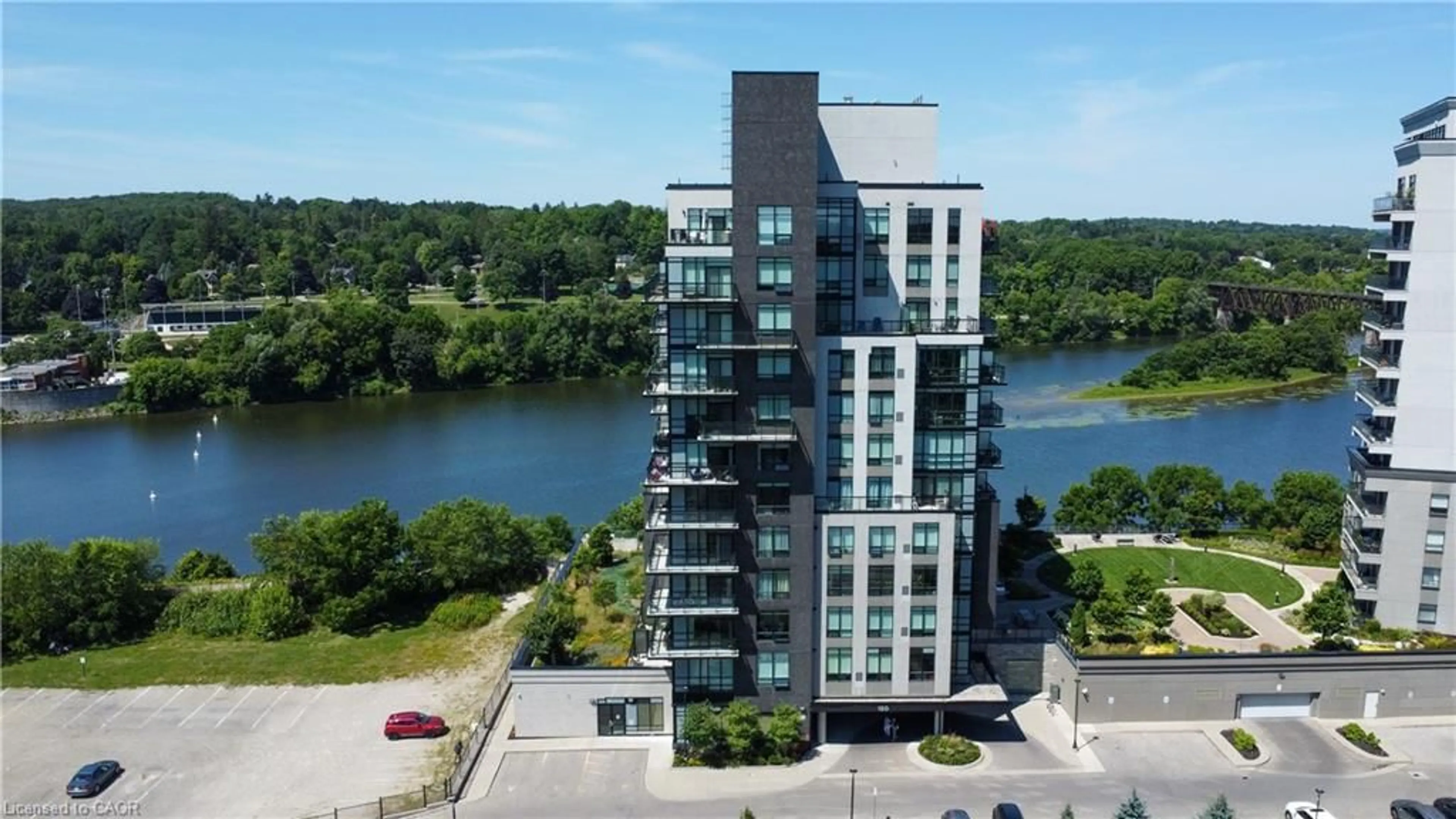 A pic from outside/outdoor area/front of a property/back of a property/a pic from drone, water/lake/river/ocean view for 150 Water St #1007, Cambridge Ontario N1R 0B5