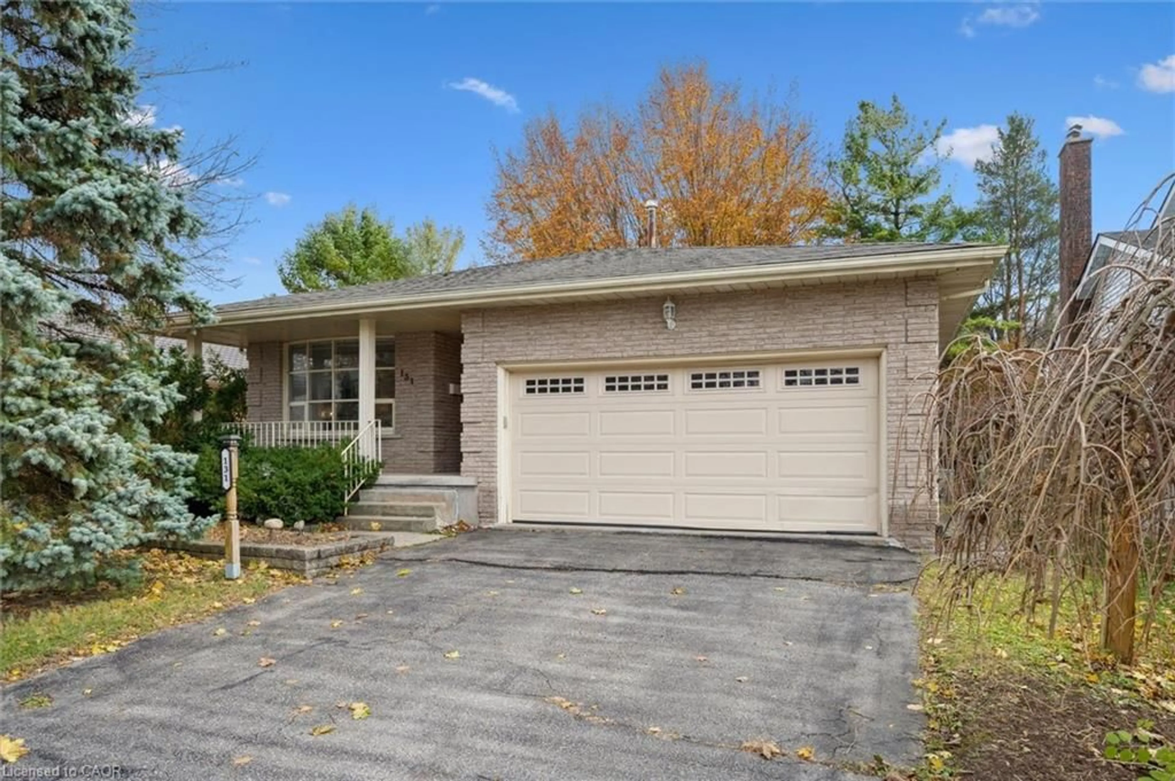 Home with brick exterior material, street for 131 Woodbend Cres, Waterloo Ontario N2T 1C9