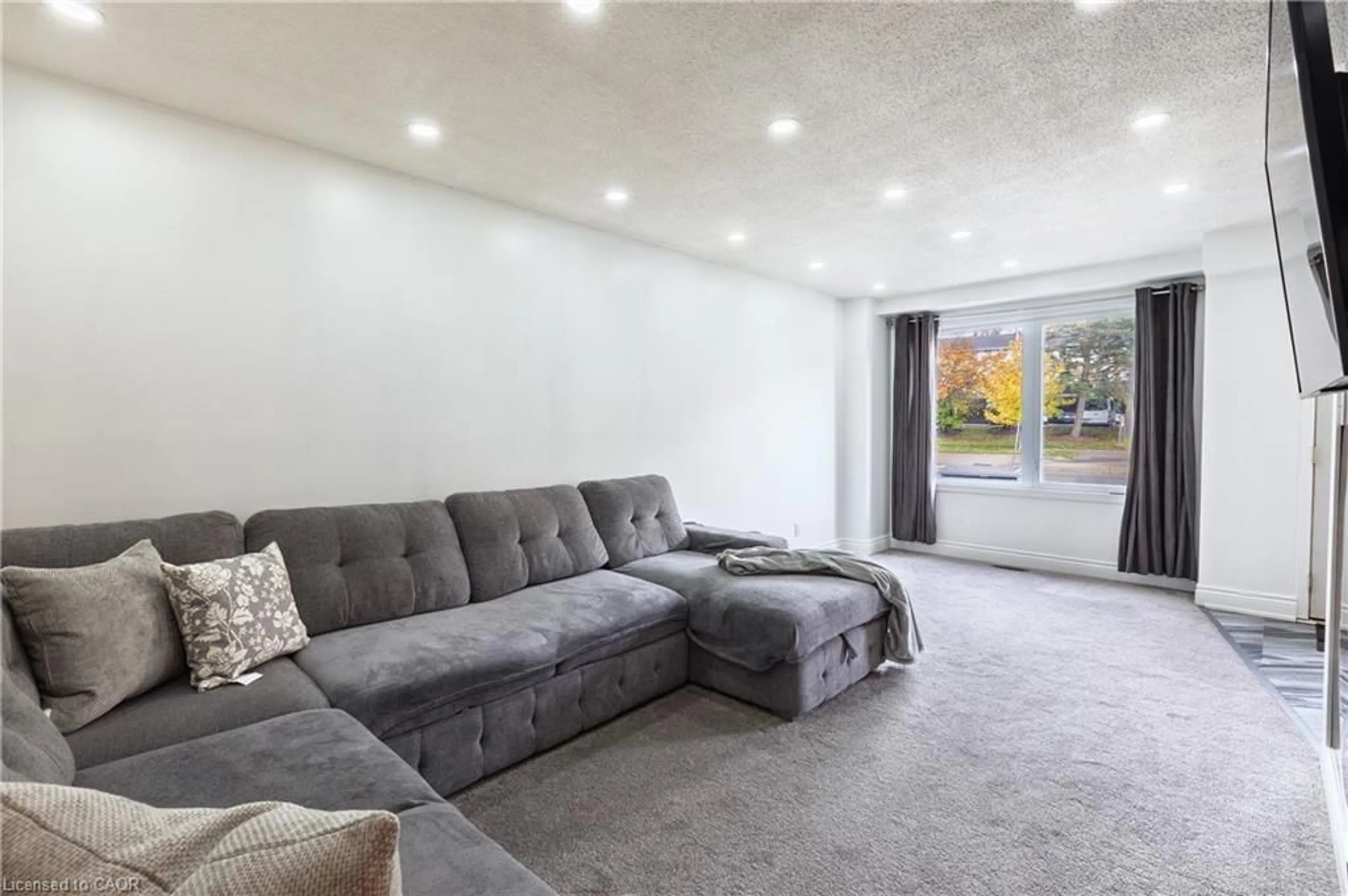 Living room with furniture, unknown for 445 Pioneer Dr #4, Kitchener Ontario N2P 1L8