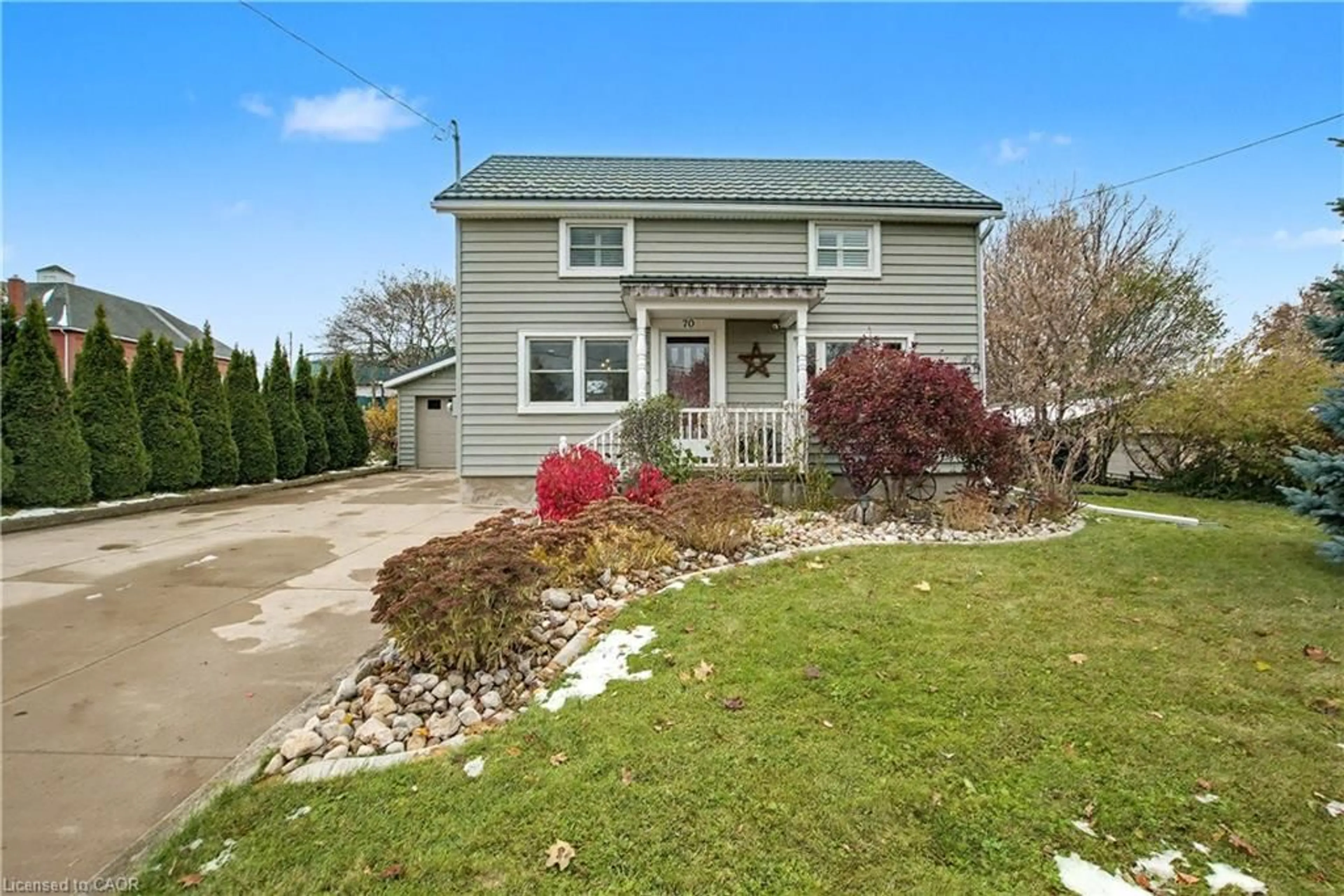 Home with vinyl exterior material, street for 70 Young St, St. Jacobs Ontario N0B 2N0