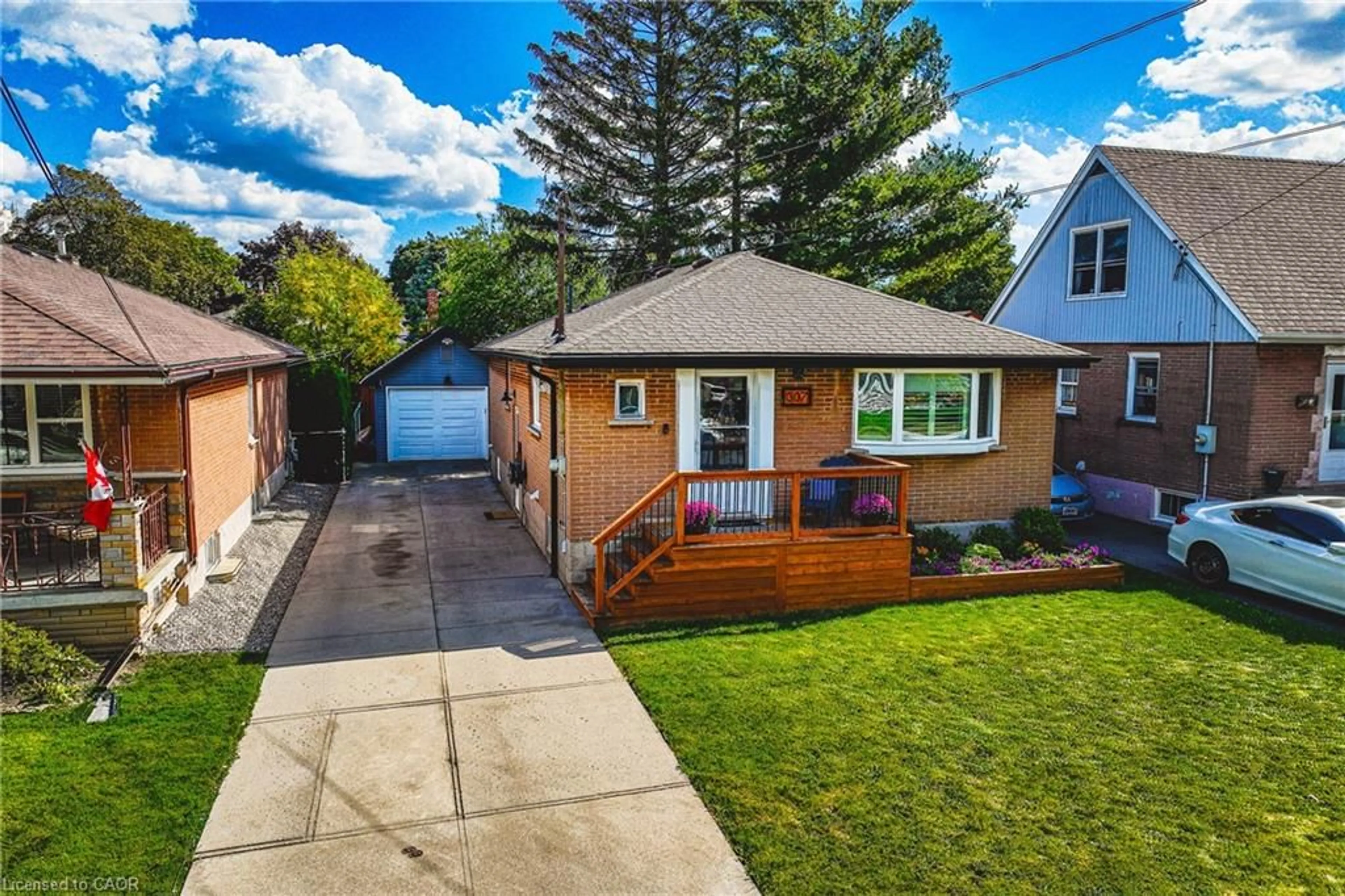 Home with brick exterior material, street for 307 East 33rd St, Hamilton Ontario L8V 3T9