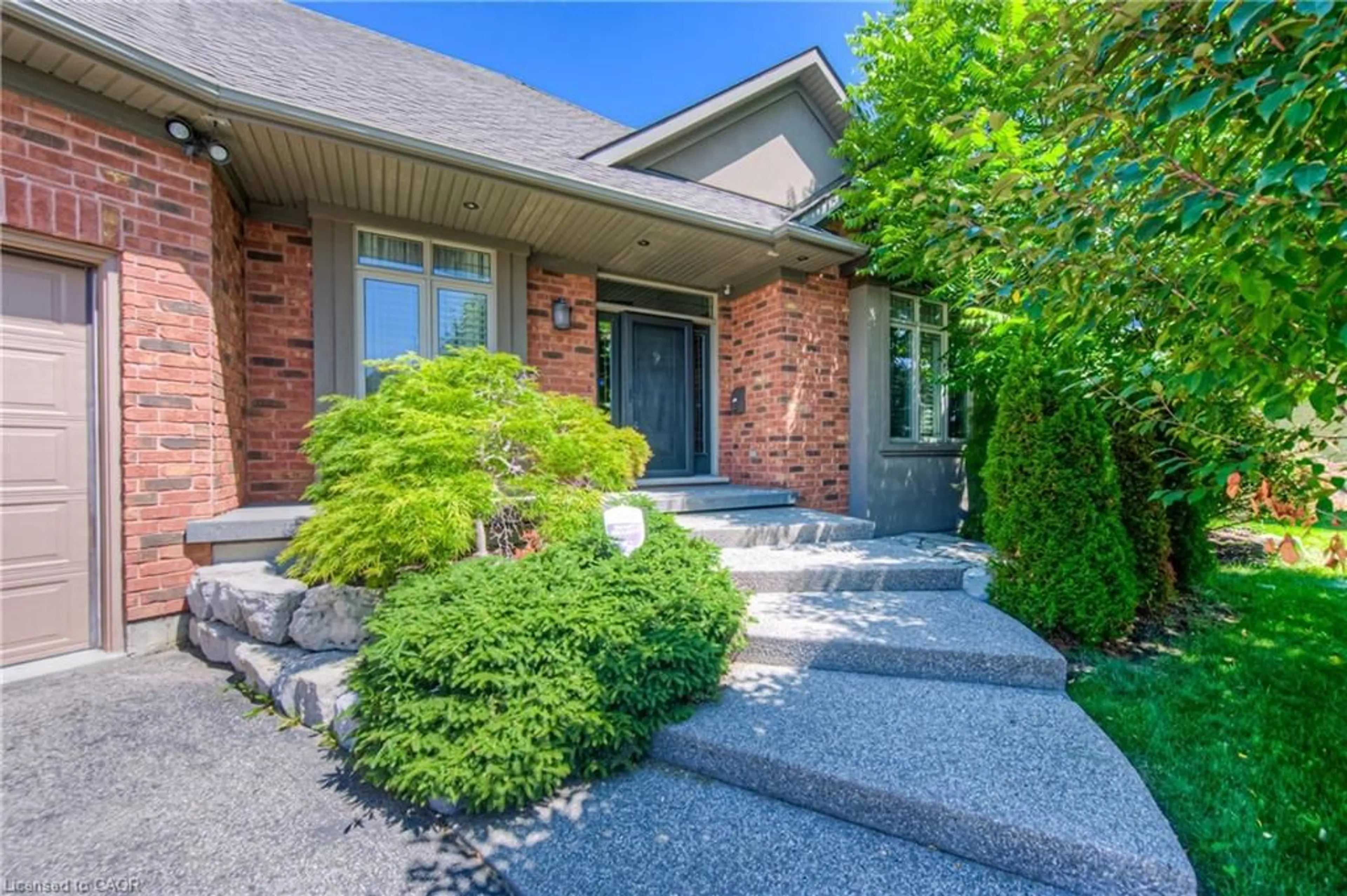 Home with brick exterior material, street for 75 Wagon St, Kitchener Ontario N2P 2V2