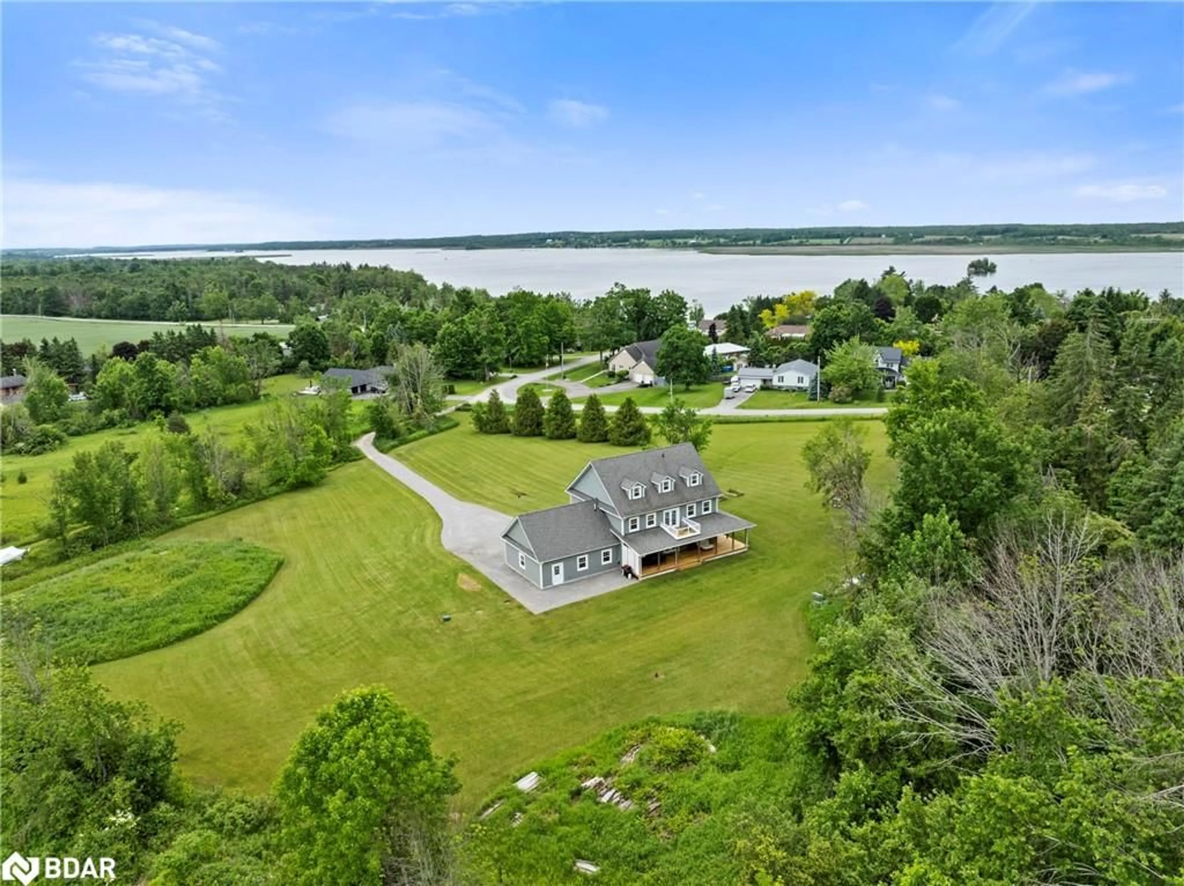 A pic from outside/outdoor area/front of a property/back of a property/a pic from drone, water/lake/river/ocean view for 187 Kildeer Lane, Peterborough Ontario K0L 1T0