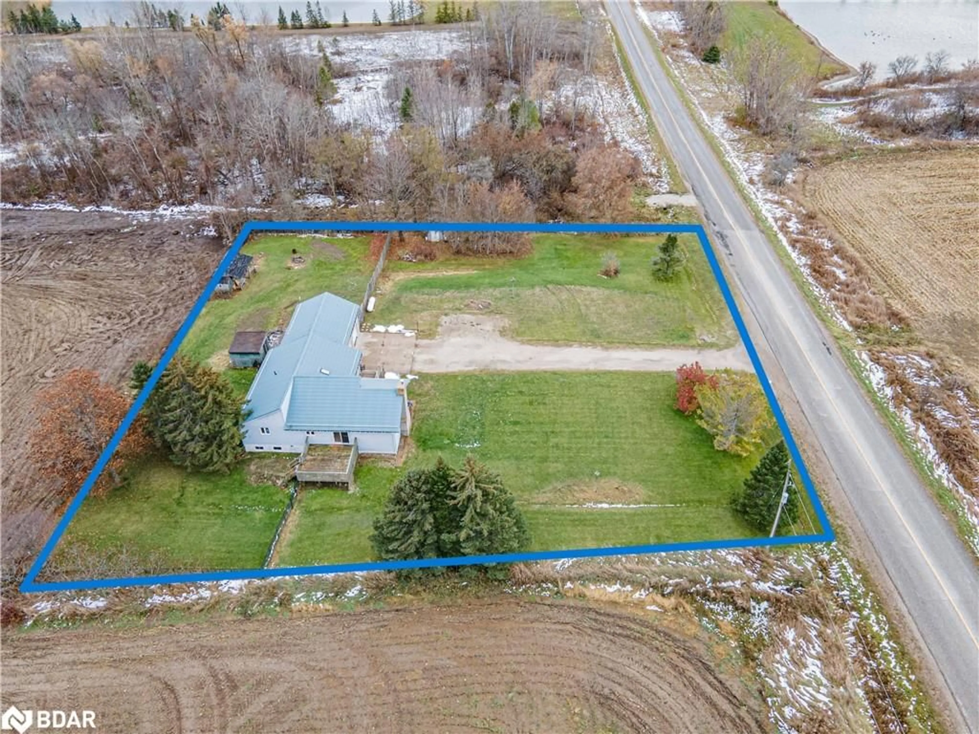 A pic from outside/outdoor area/front of a property/back of a property/a pic from drone, water/lake/river/ocean view for 2717 3/4 Sunn Side Side Road, New Lowell Ontario L0M 1N0