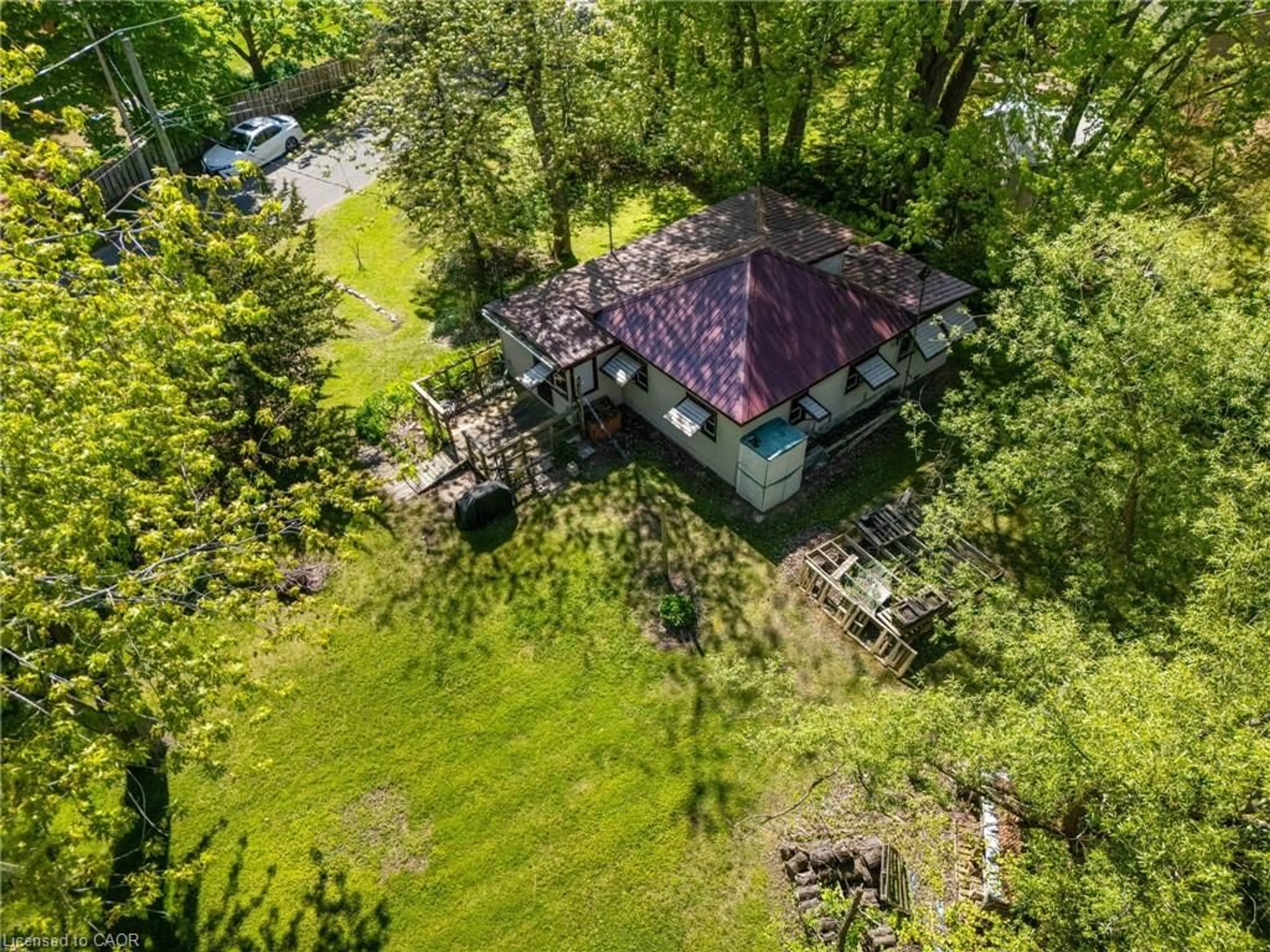 A pic from outside/outdoor area/front of a property/back of a property/a pic from drone, unknown for 303 Erie Blvd, Long Point Ontario N0E 1M0