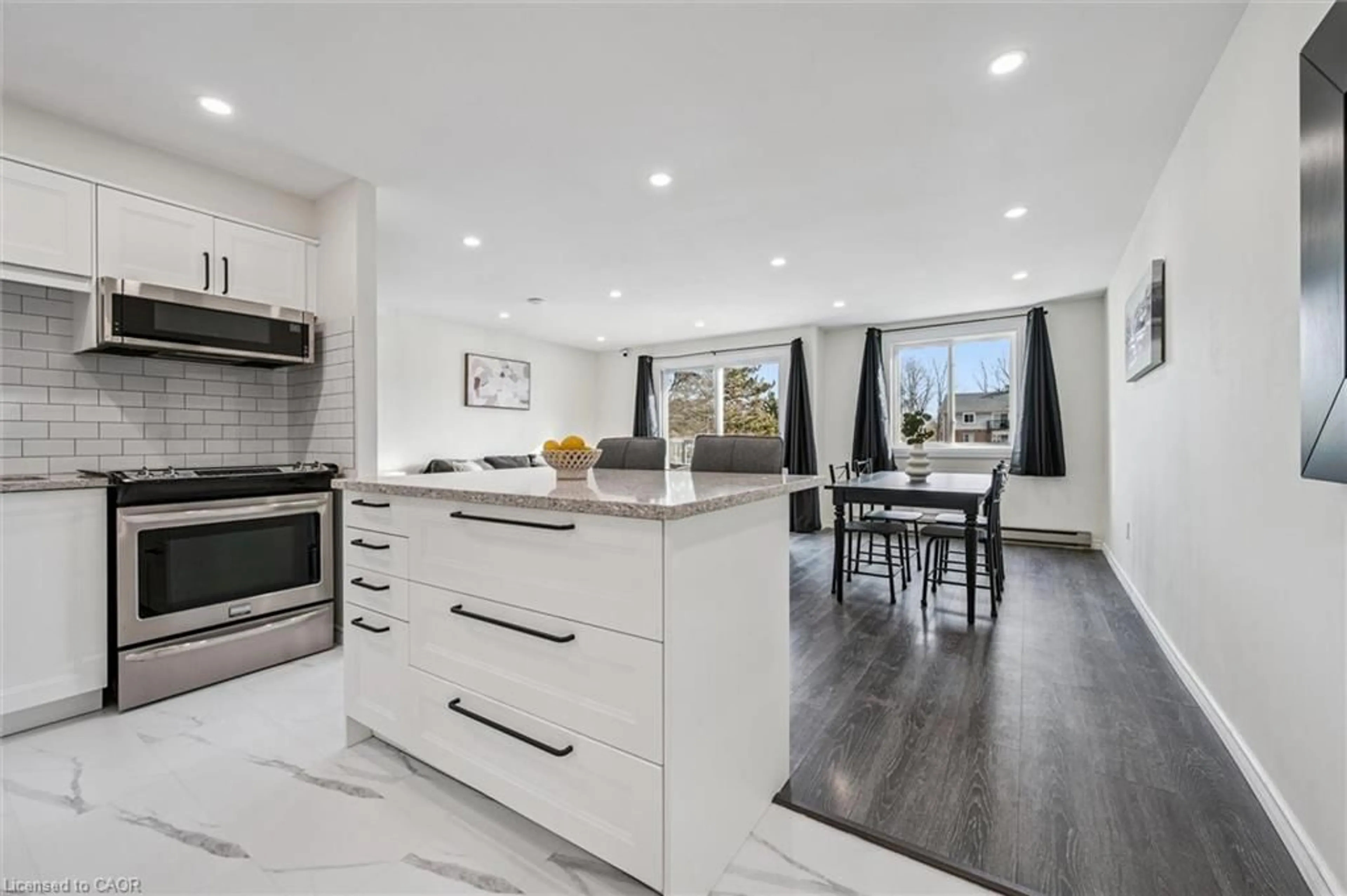 Open concept kitchen, ceramic/tile floor for 276 Eiwo Crt #208, Waterloo Ontario N2K 3M6