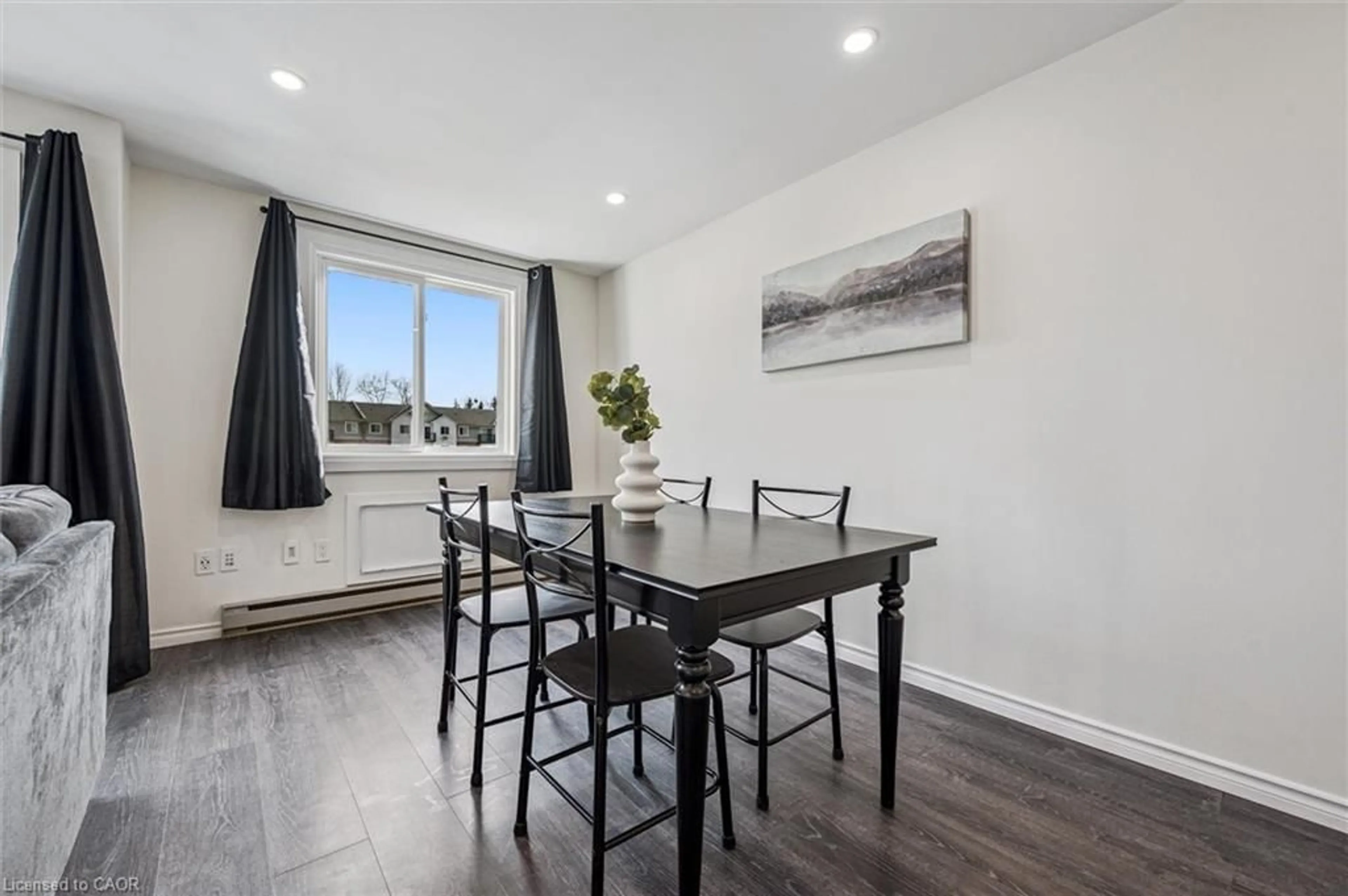 Dining room, wood/laminate floor for 276 Eiwo Crt #208, Waterloo Ontario N2K 3M6