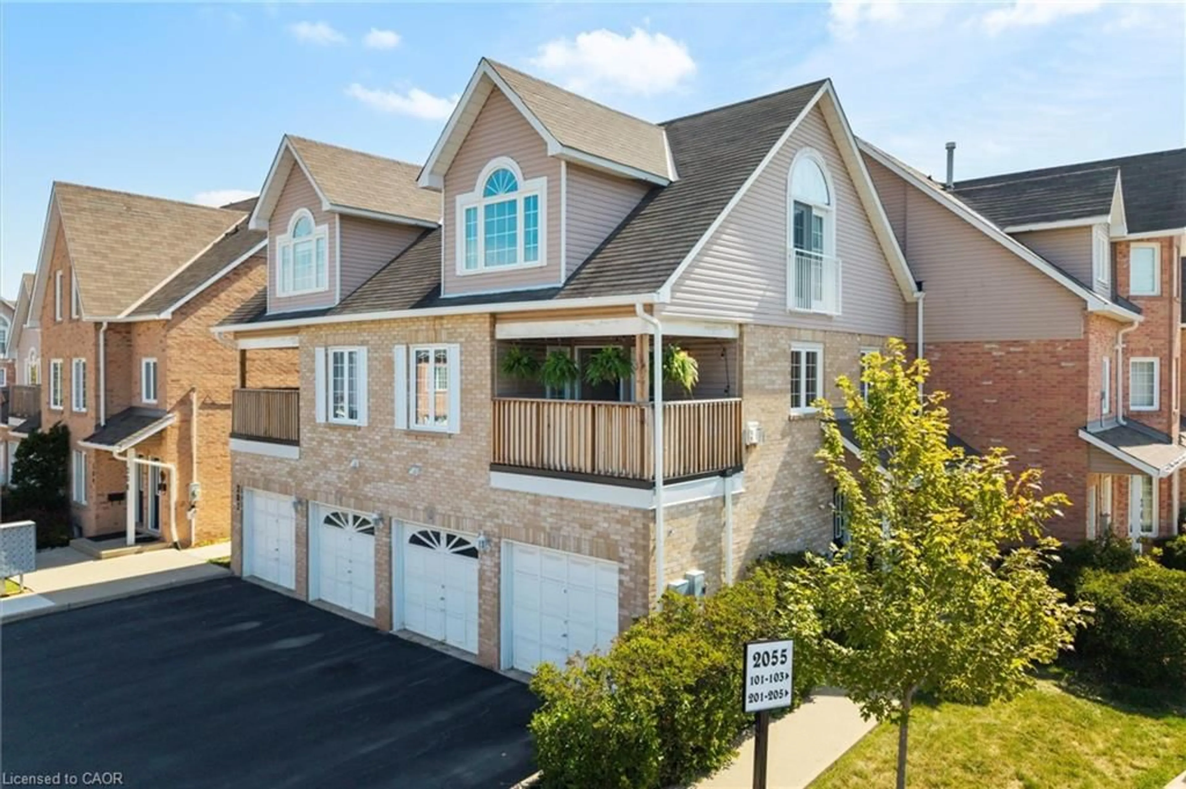 Home with brick exterior material, street for 2055 Walkers Line #206, Burlington Ontario L7M 4B5