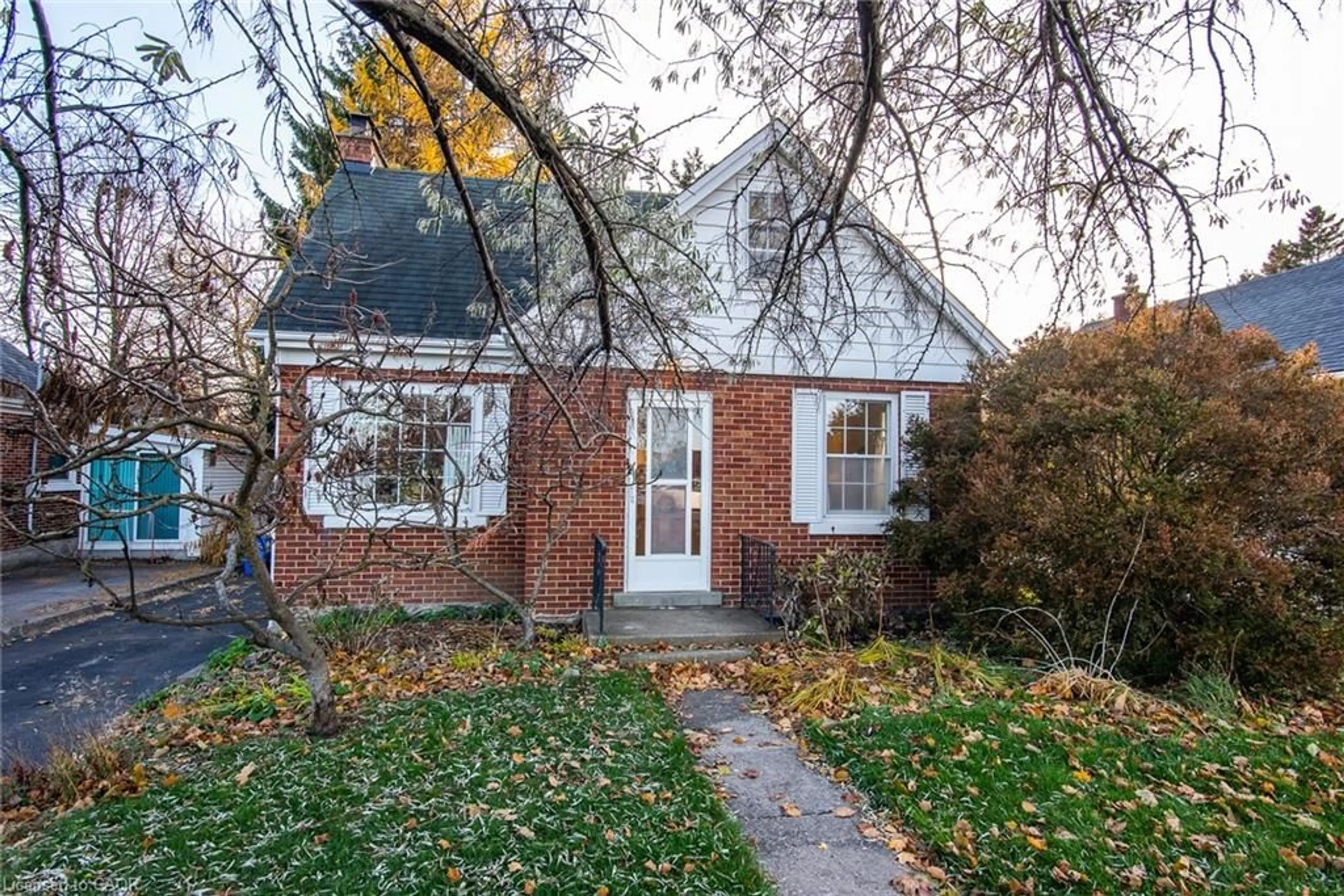 Home with brick exterior material, street for 69 Floral Cres, Kitchener Ontario N2G 3B3