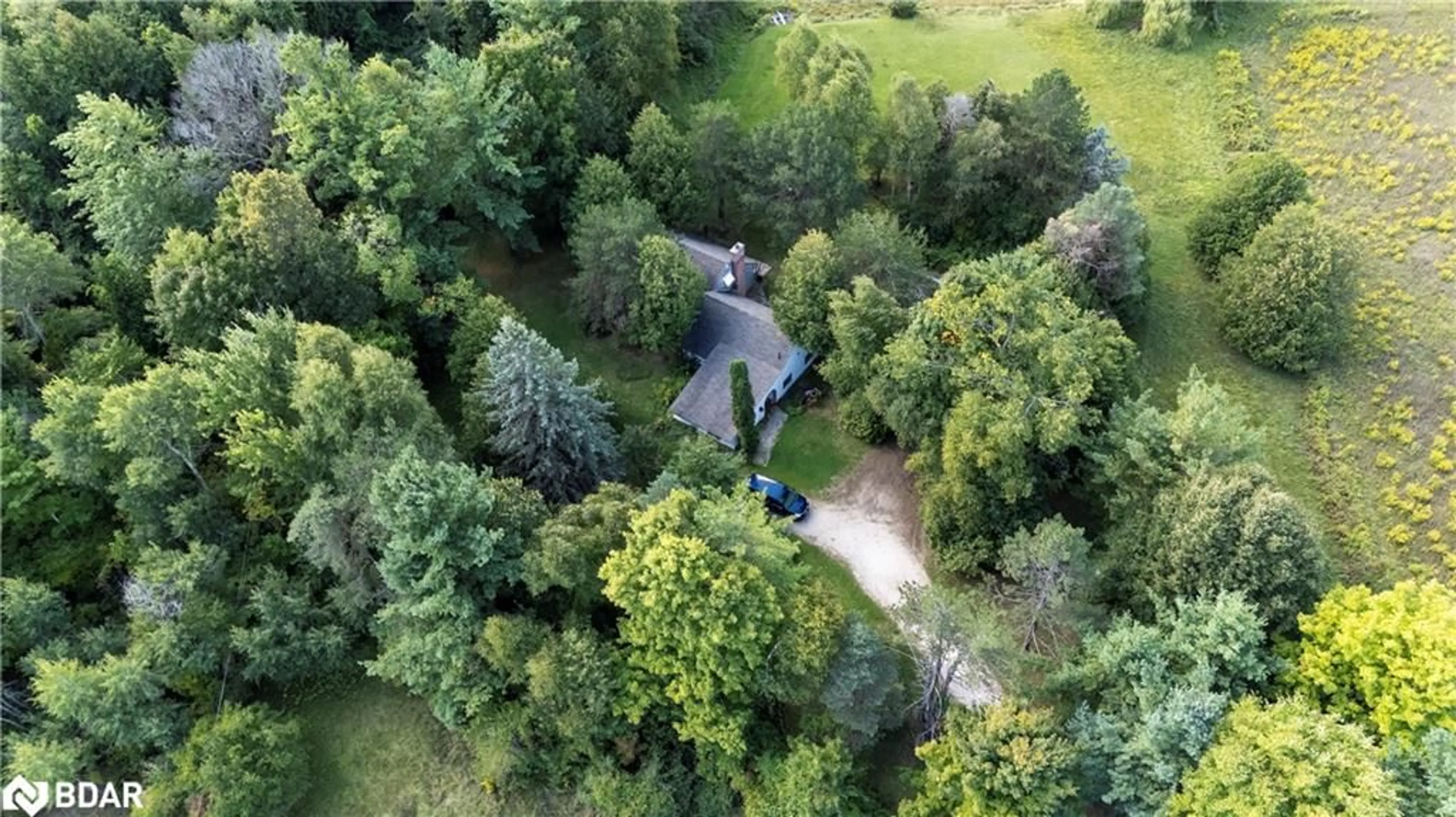 A pic from outside/outdoor area/front of a property/back of a property/a pic from drone, forest/trees view for 13968 9th Line, Halton Hills Ontario L7G 4S8