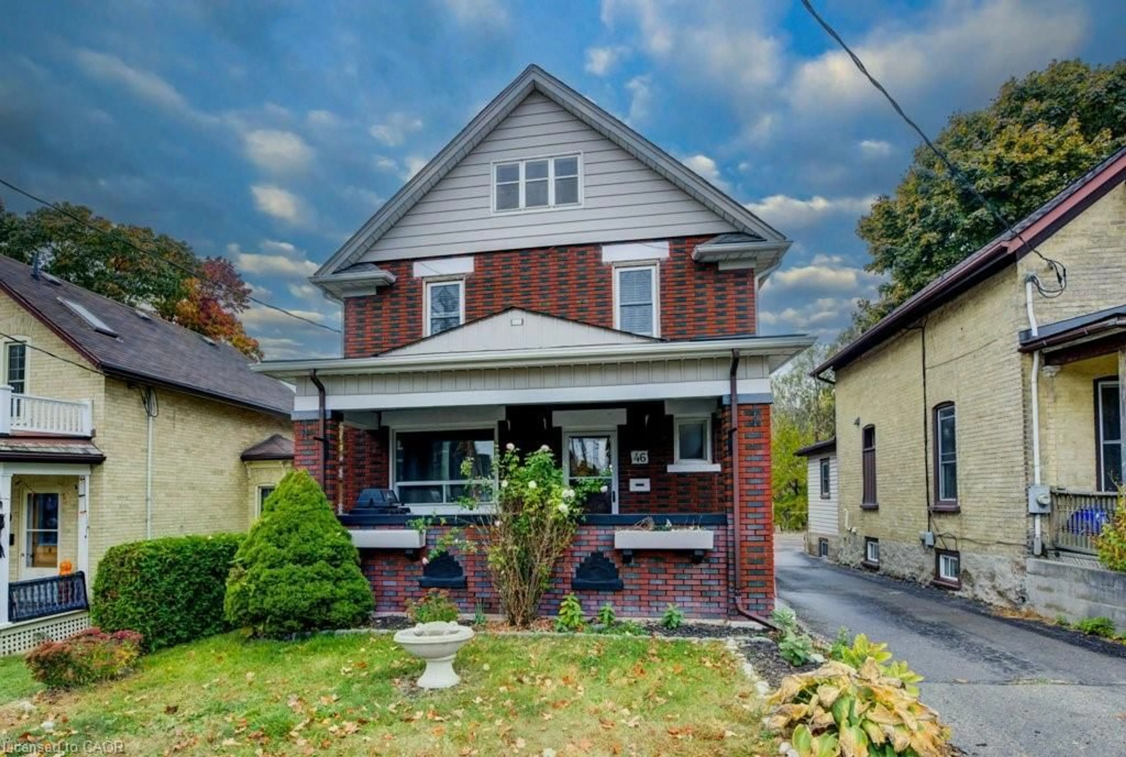 Home with brick exterior material, street for 46 Cherry St, Kitchener Ontario N2G 2C6