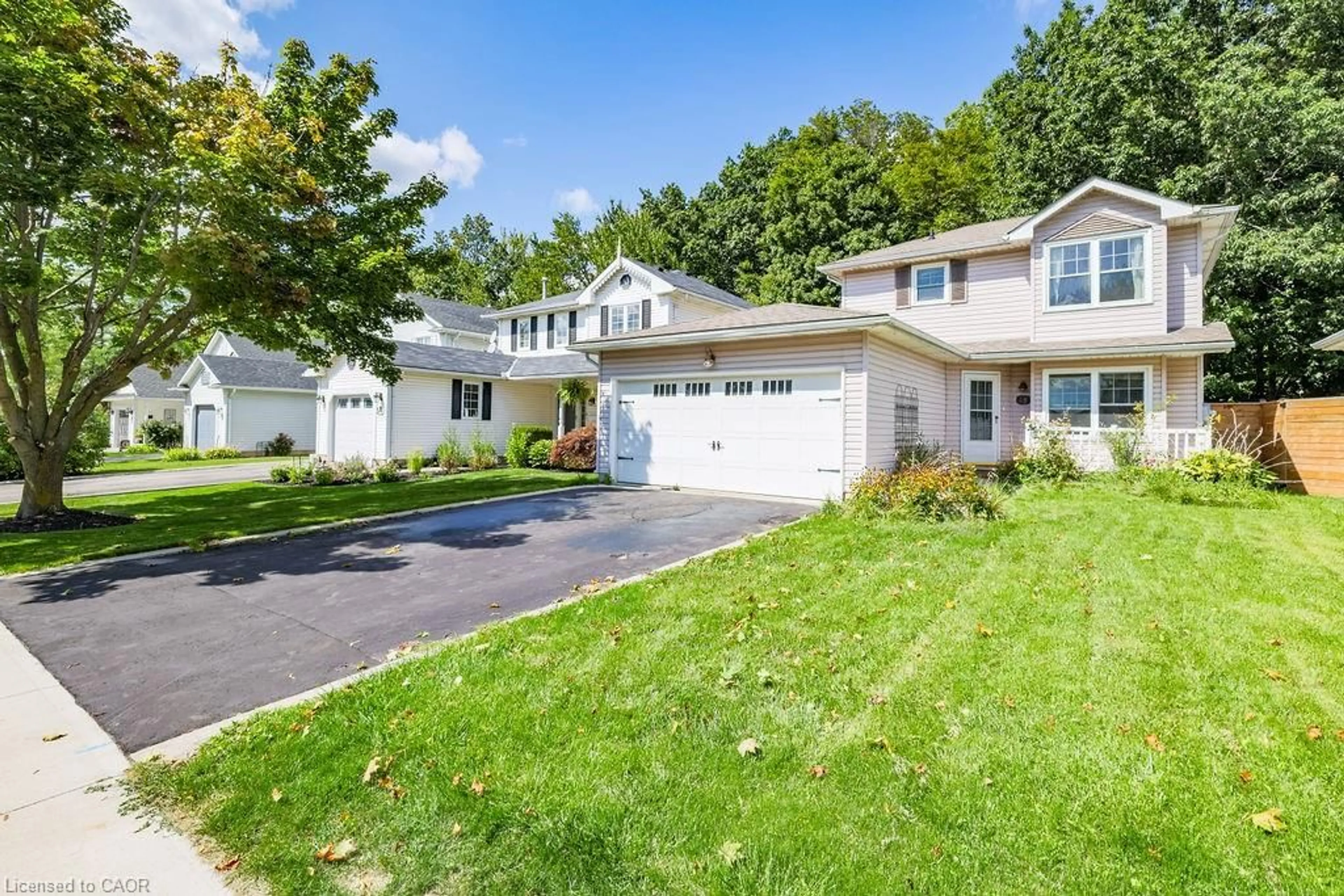 Home with vinyl exterior material, street for 48 Morgan Dr, Caledonia Ontario N3W 1H7