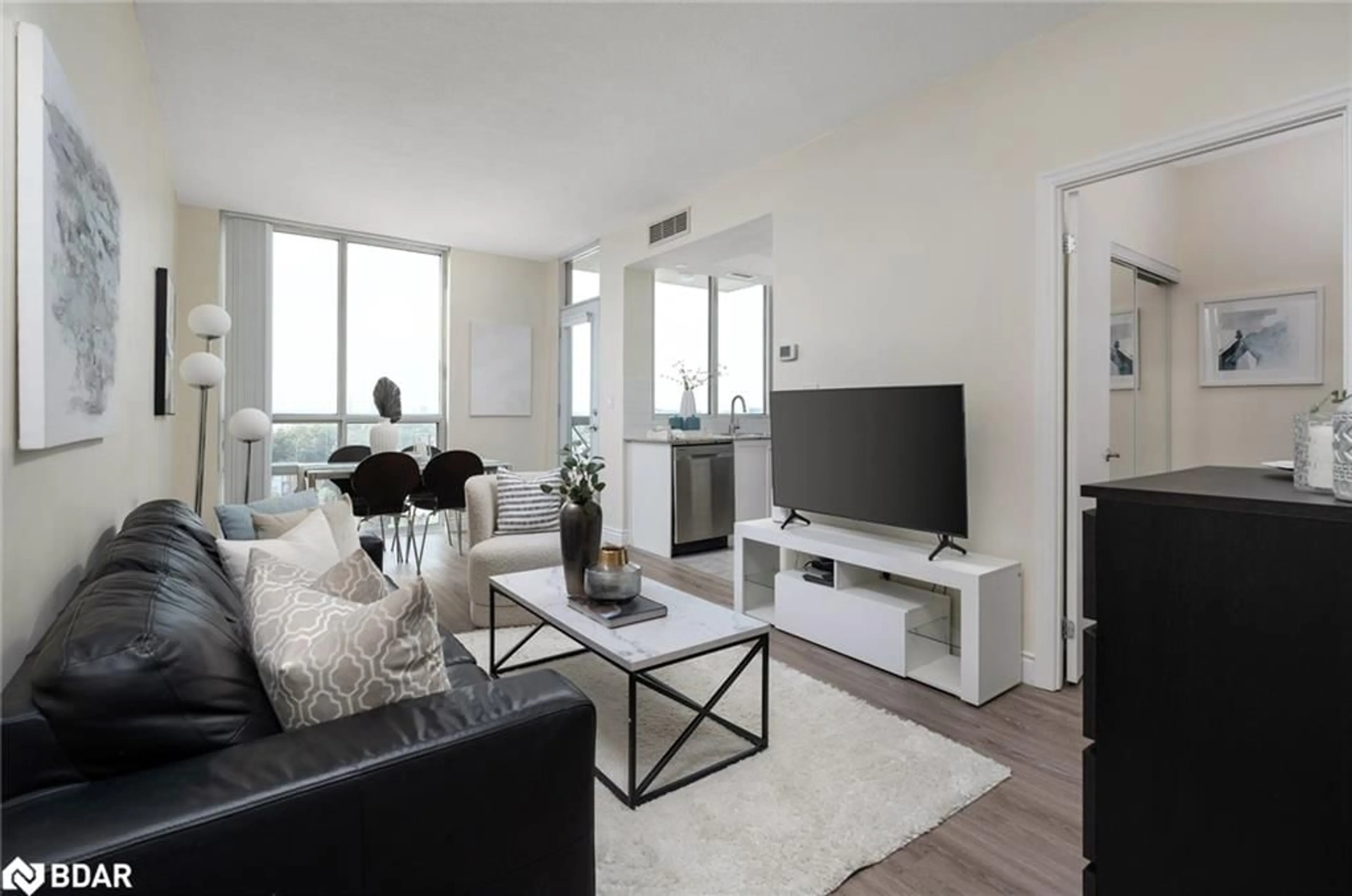 Living room with furniture, unknown for 1359 Rathburn Rd #903, Mississauga Ontario L4W 5P7