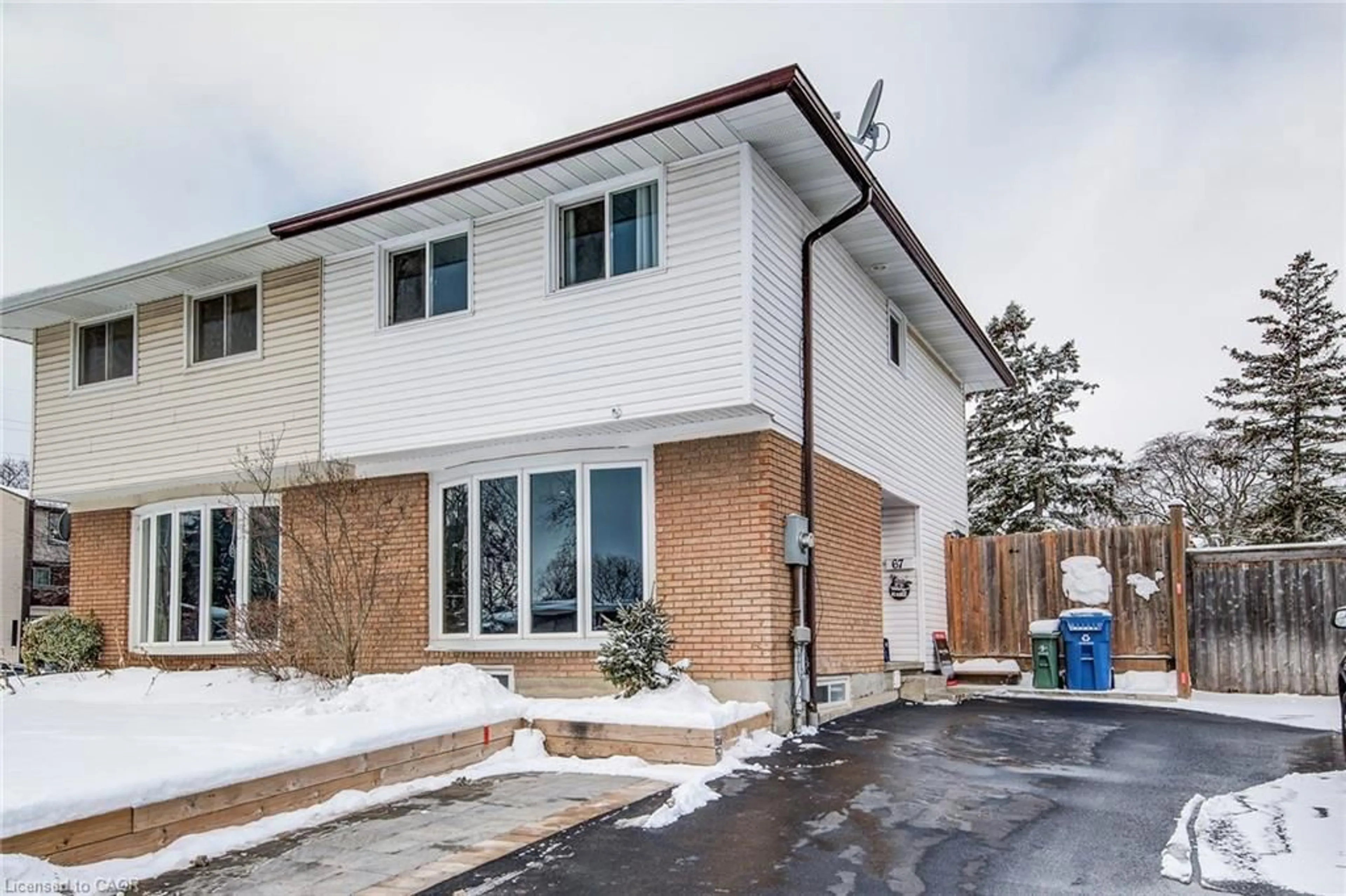 Home with brick exterior material, street for 67 Burns Dr, Guelph Ontario N1H 6V8