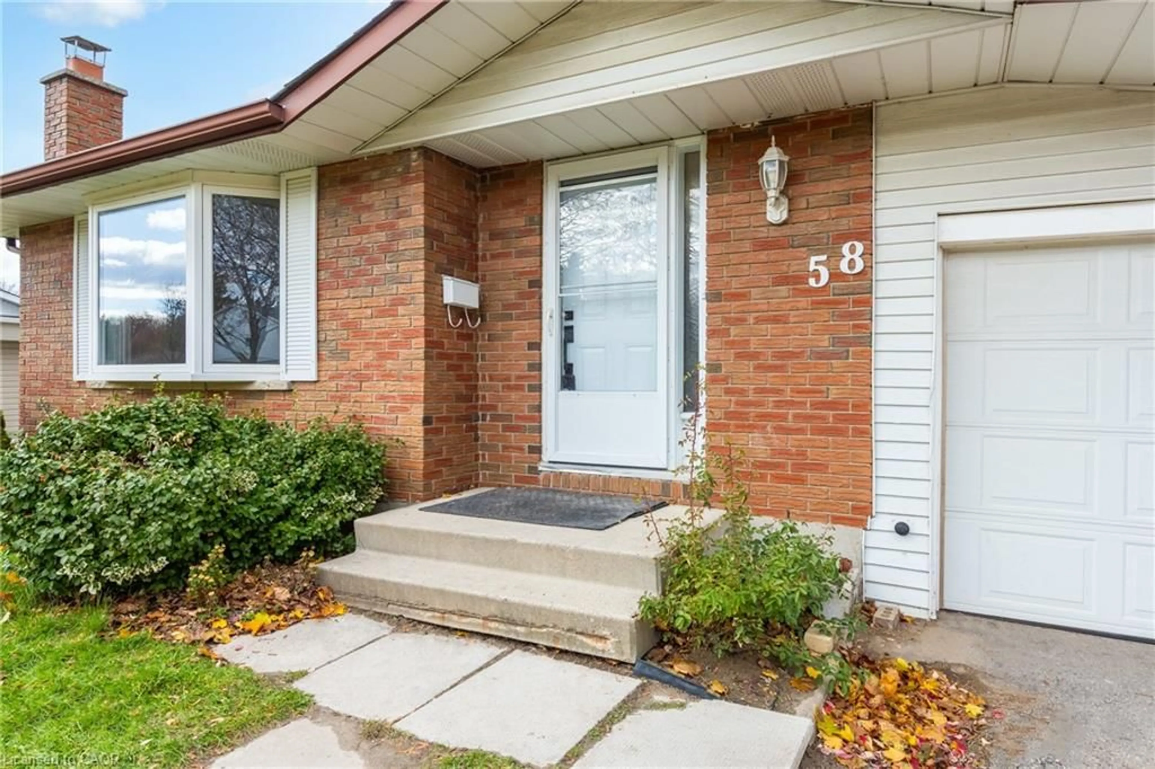 Home with brick exterior material, street for 58 Selkirk Dr, Kitchener Ontario N2E 1N2