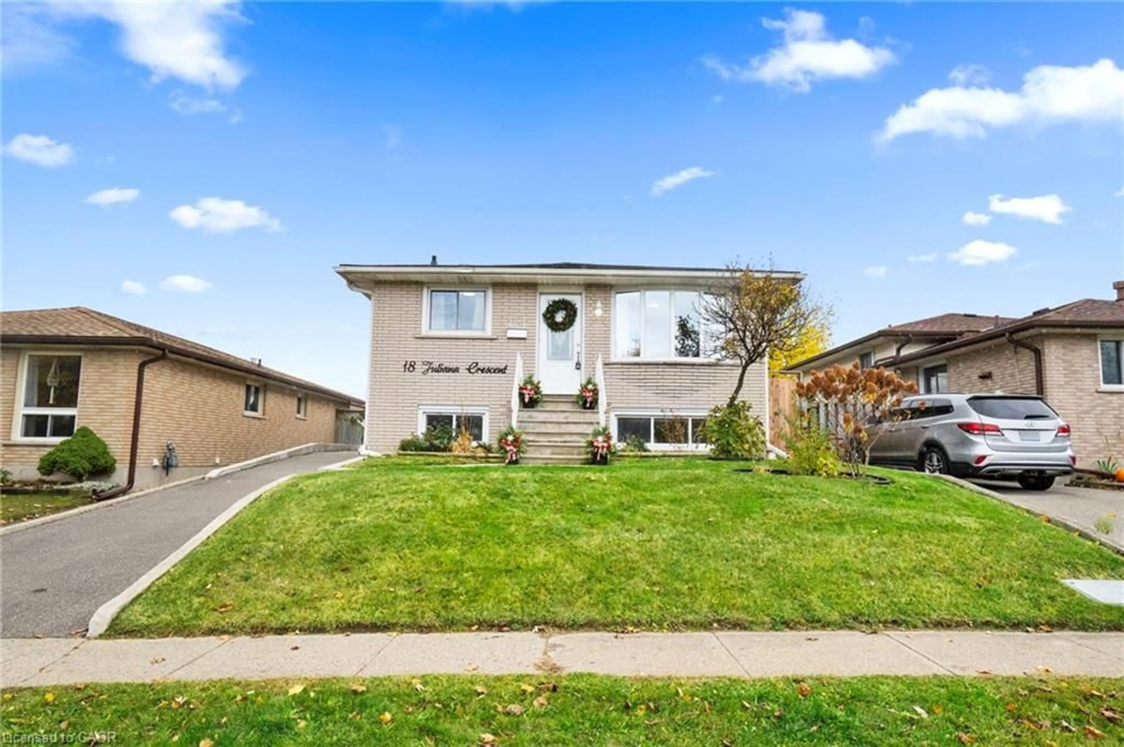 Home with vinyl exterior material, street for 18 Juliana Cres, Cambridge Ontario N1R 6W6