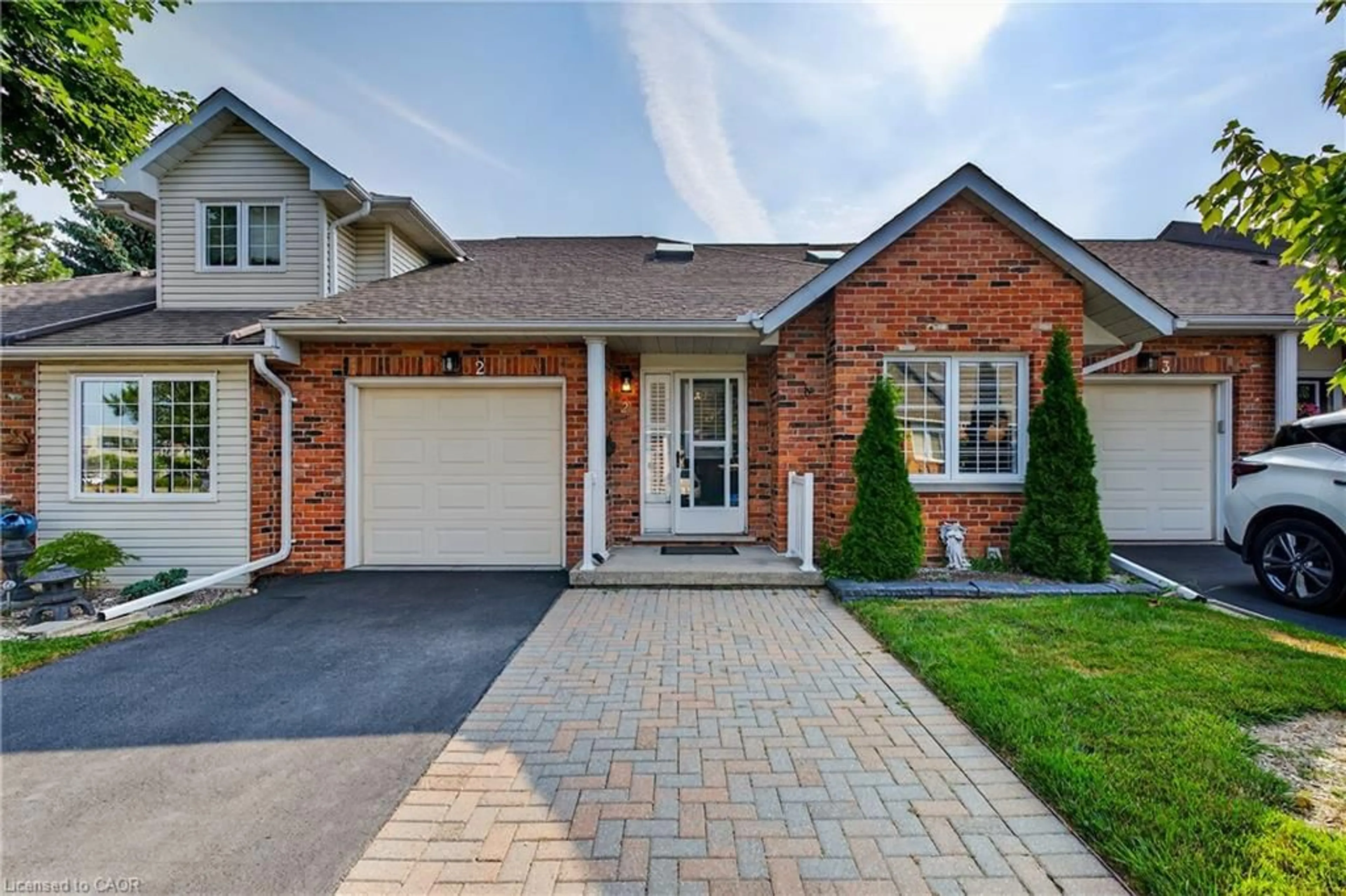 Home with brick exterior material, street for 810 Golf Links Rd #2, Ancaster Ontario L9K 1J7