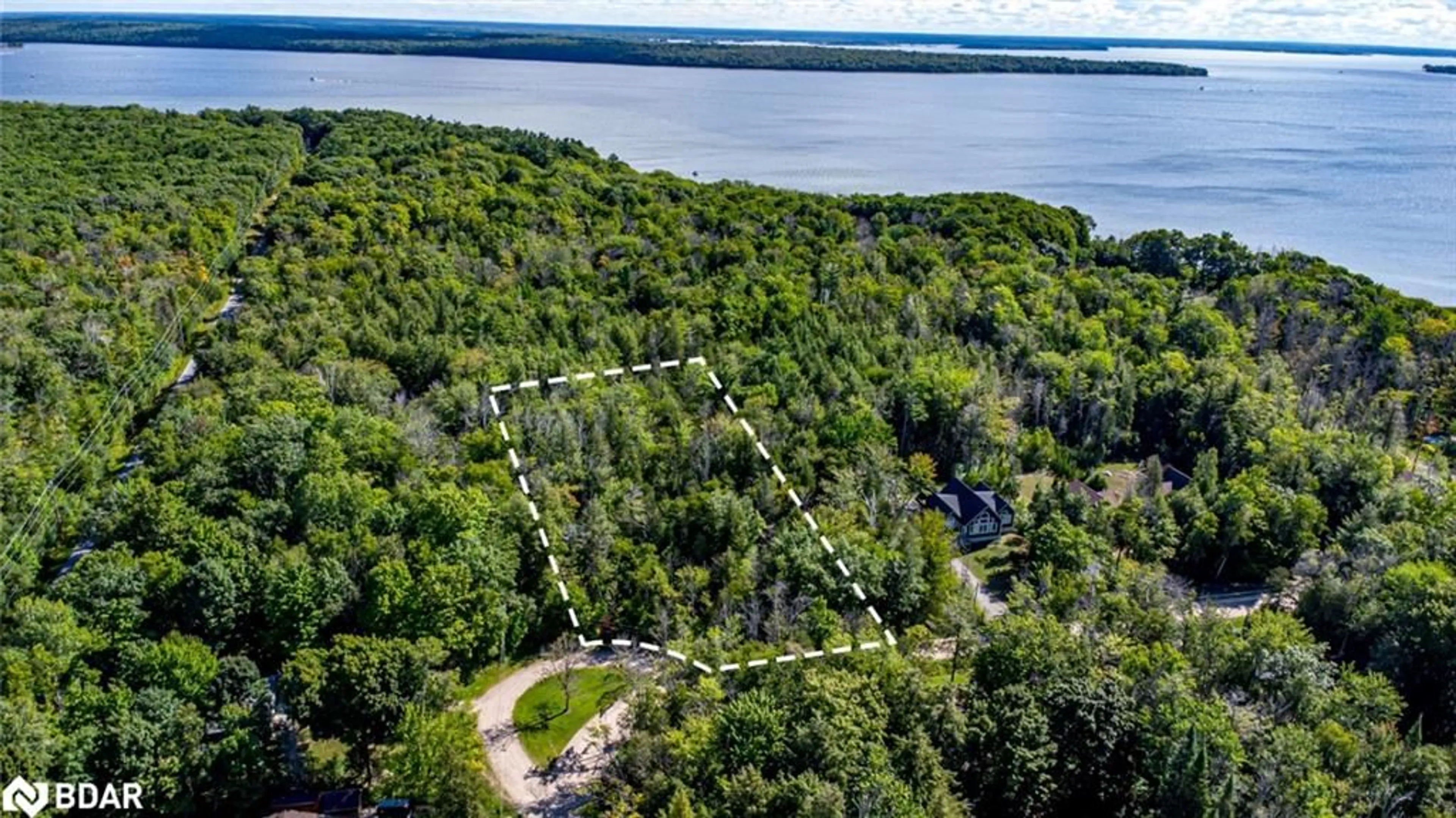 A pic from outside/outdoor area/front of a property/back of a property/a pic from drone, water/lake/river/ocean view for 38 Lasalle Trail, Tiny Ontario L9M 0G3