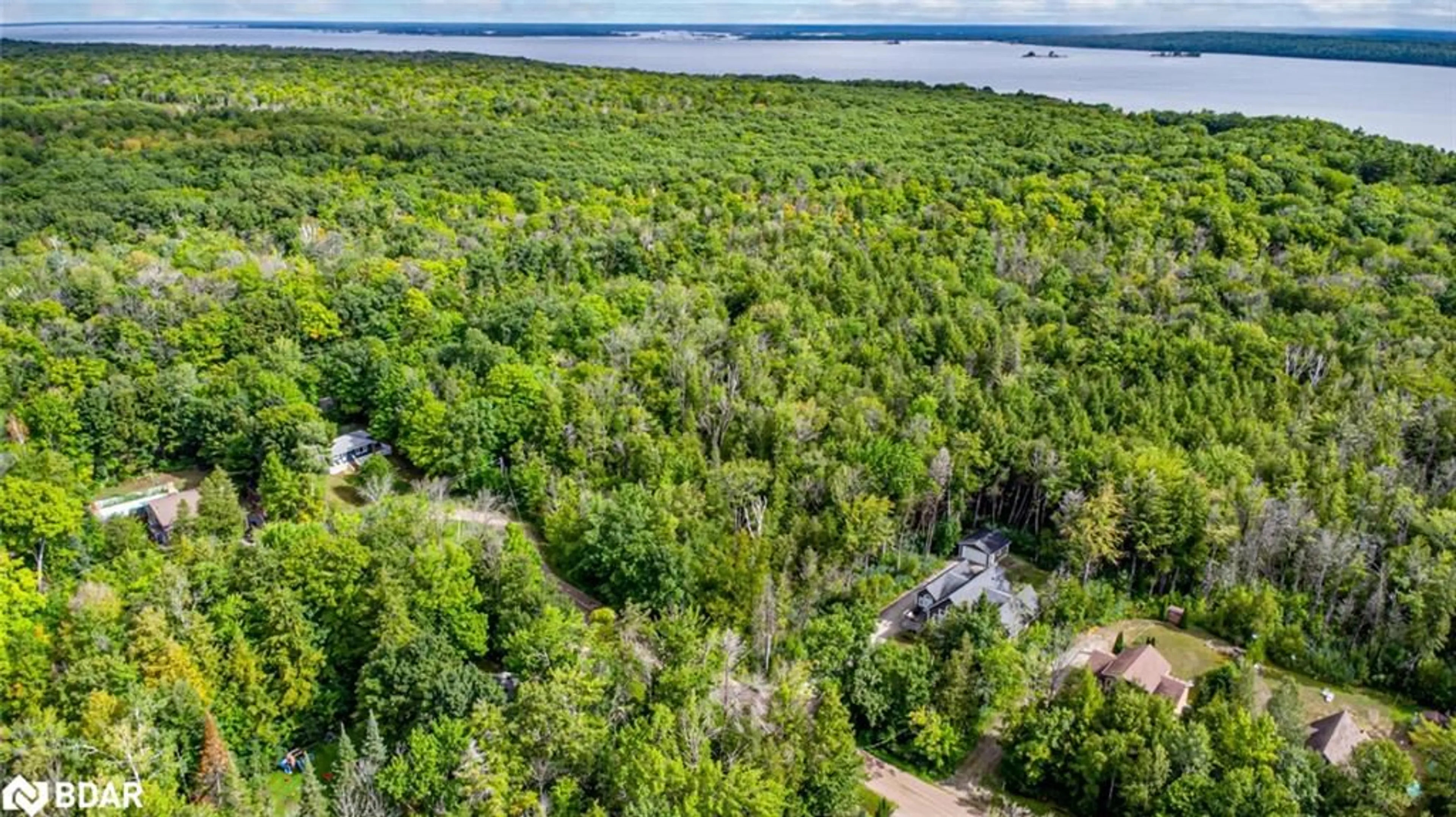 A pic from outside/outdoor area/front of a property/back of a property/a pic from drone, water/lake/river/ocean view for 38 Lasalle Trail, Tiny Ontario L9M 0G3